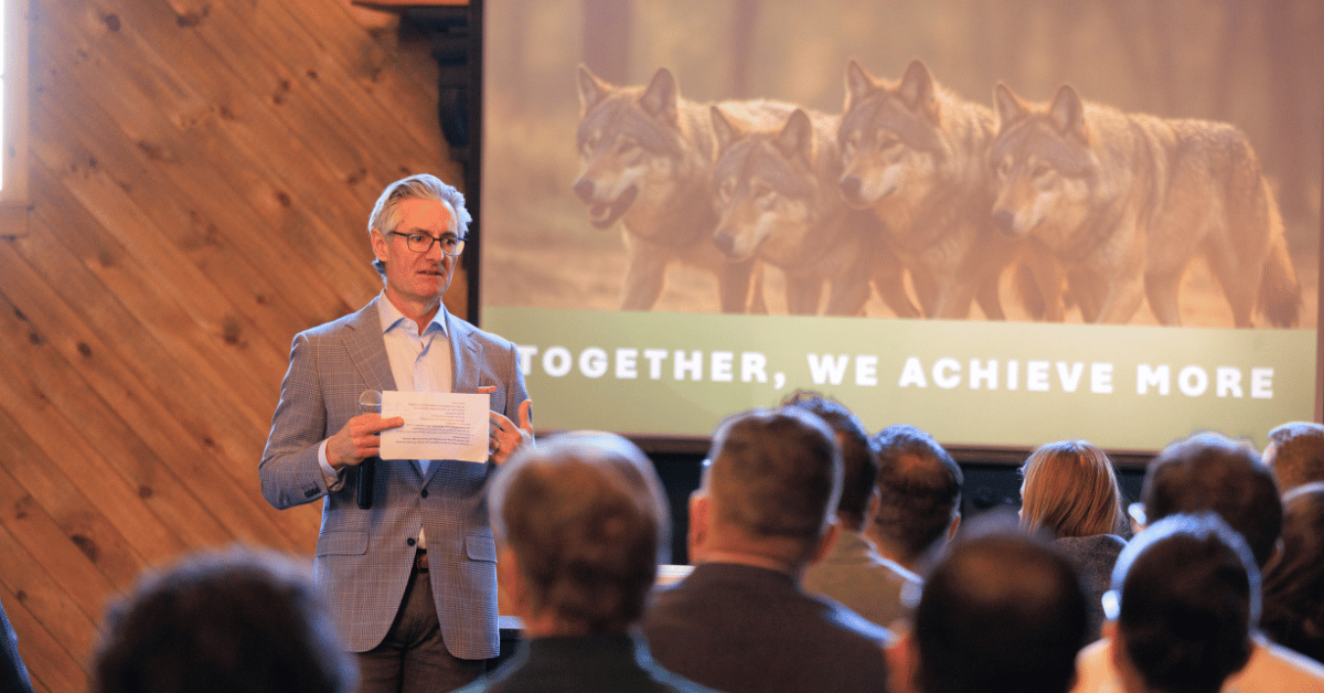 Executive VP, Dave, delivering an inspiring message: together, we achieve ore