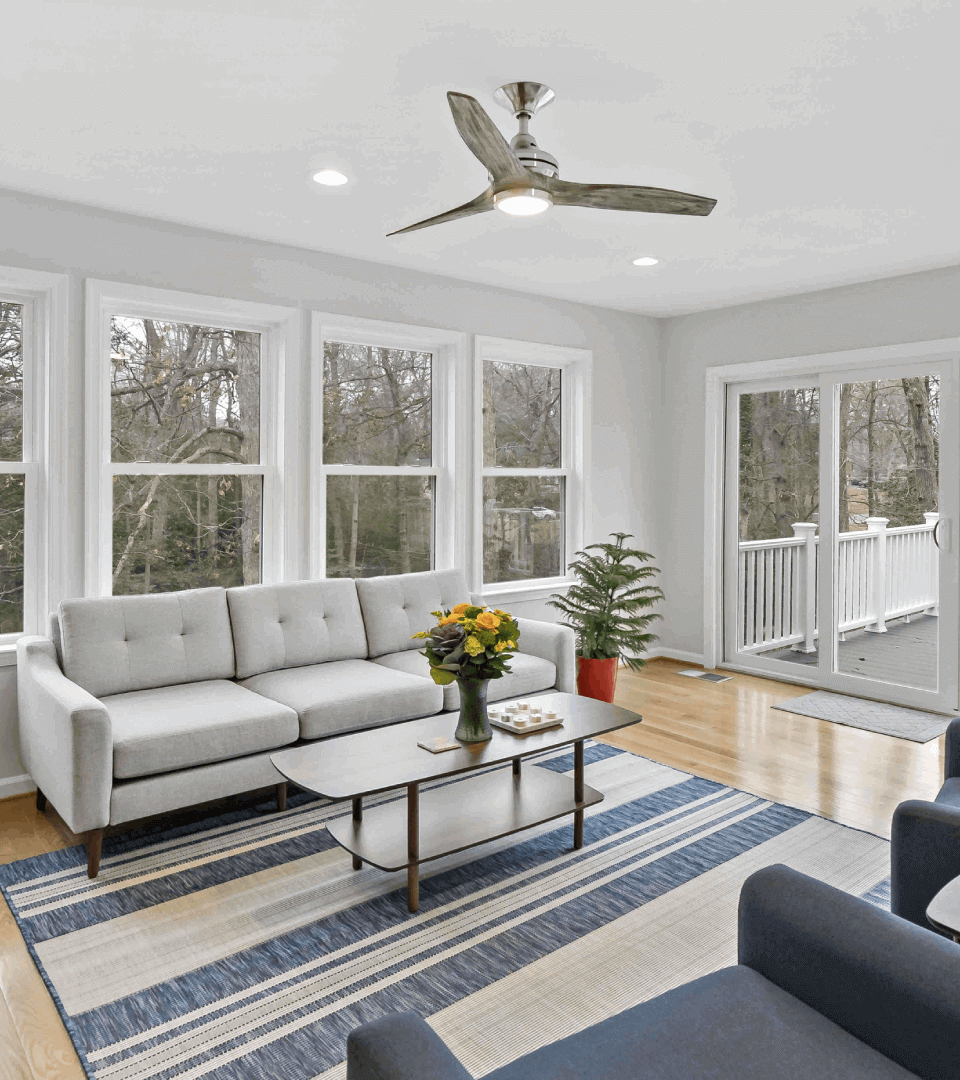 Spacious sitting area sunroom with large windows