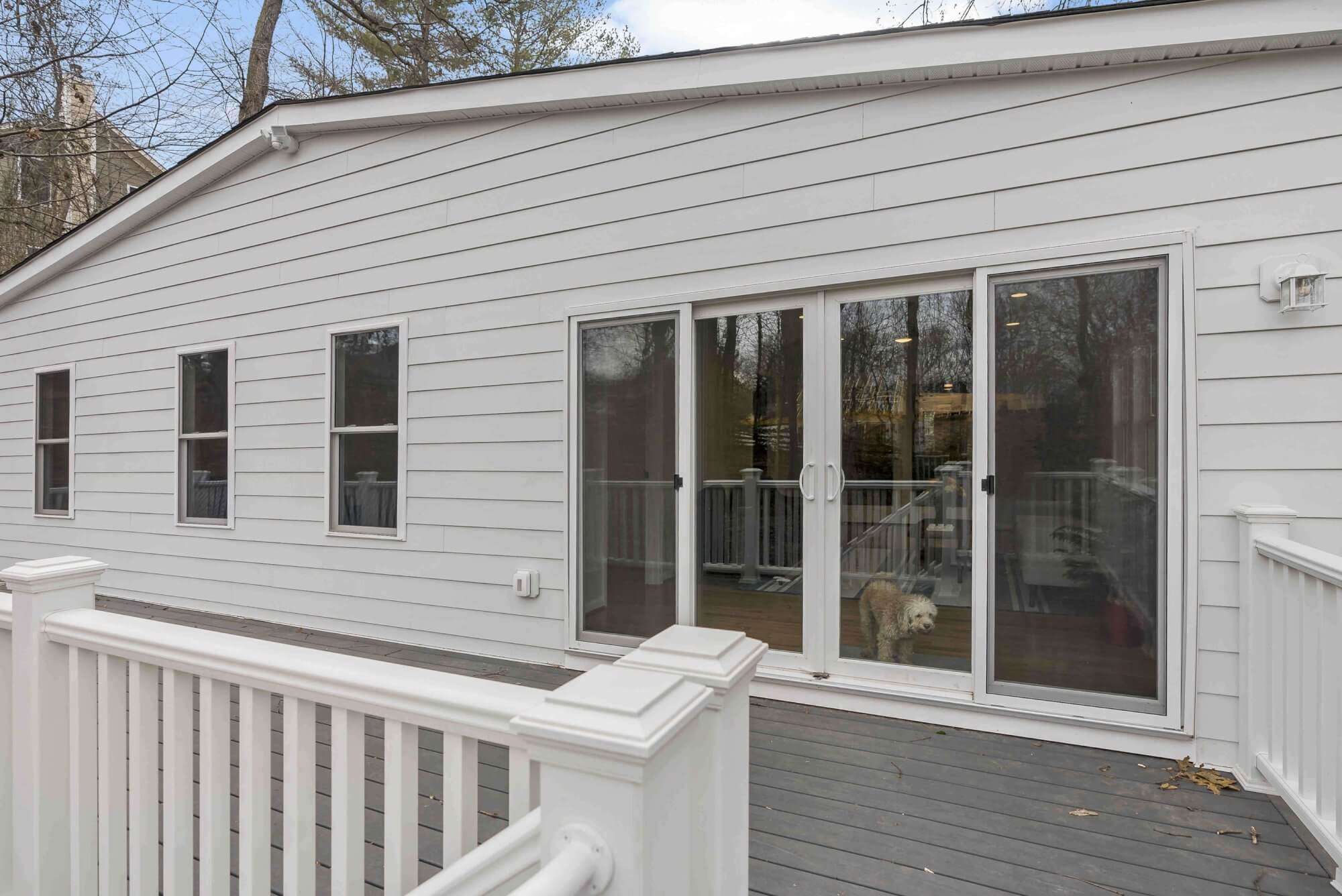 Back patio with sliding door access to inside the house