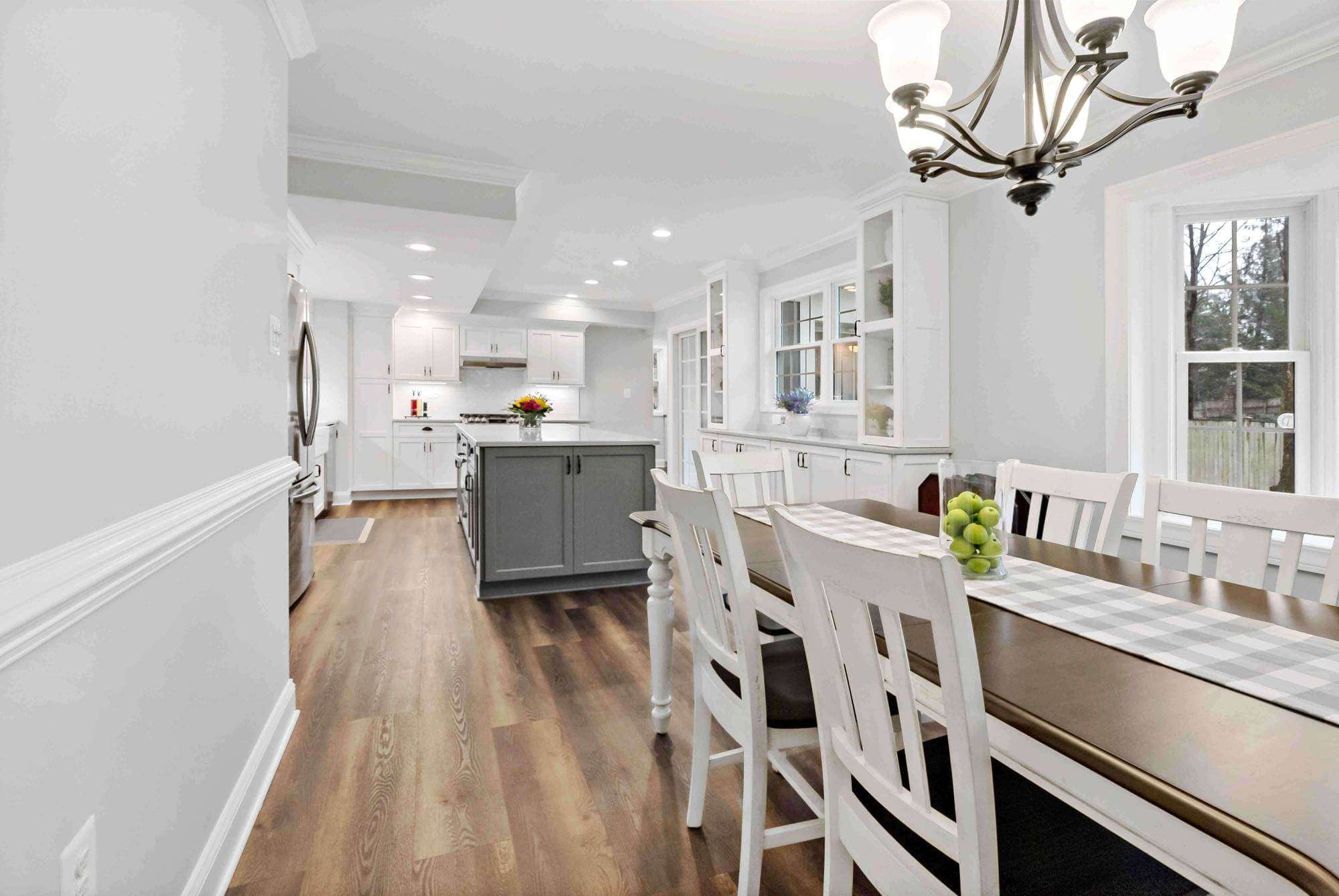 Dining table with chandelier above