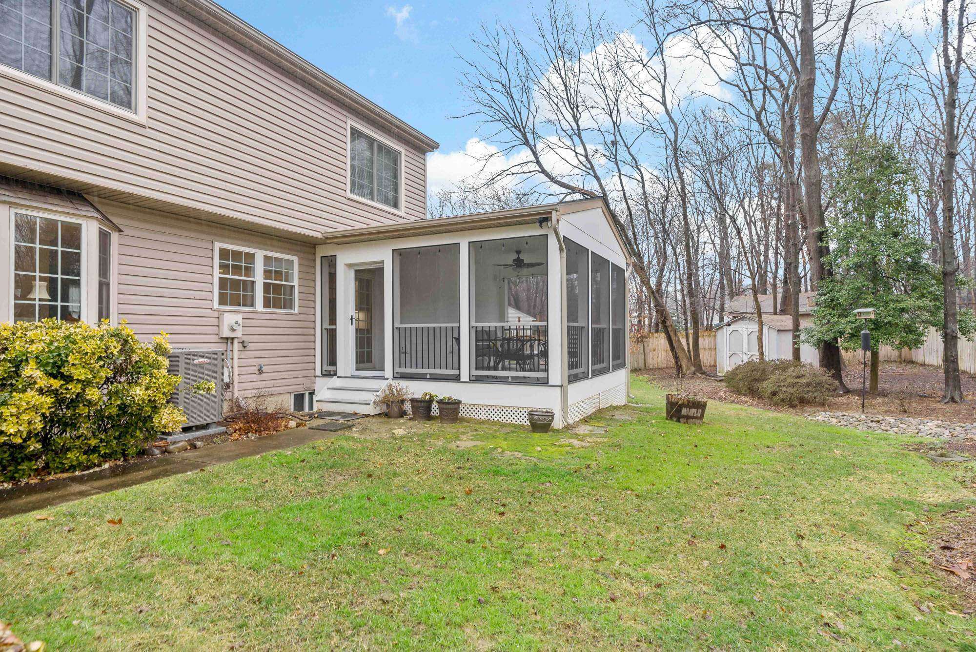 Exterior of screened in porch addition in Reston