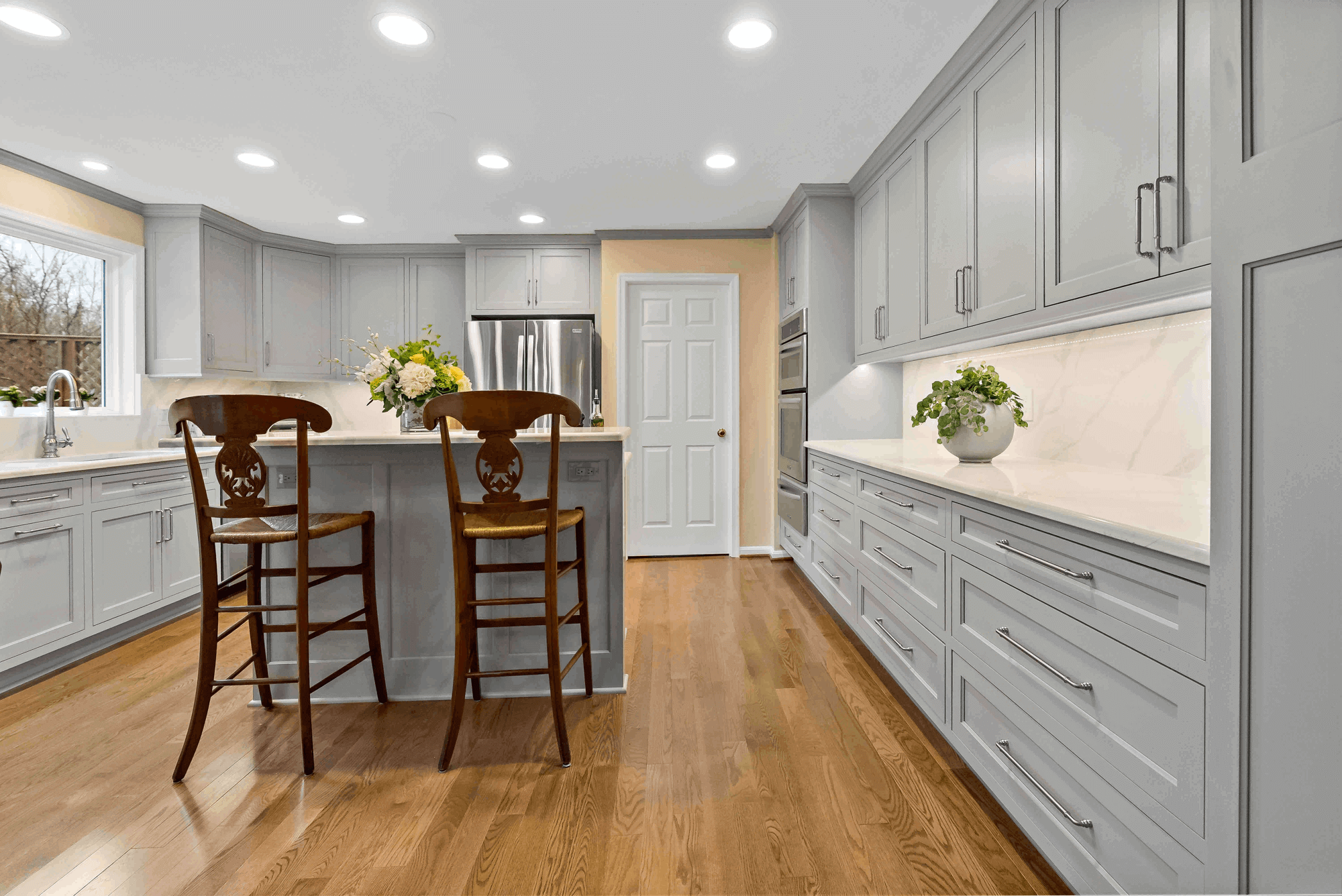 Kitchen island seating with wooden chairs
