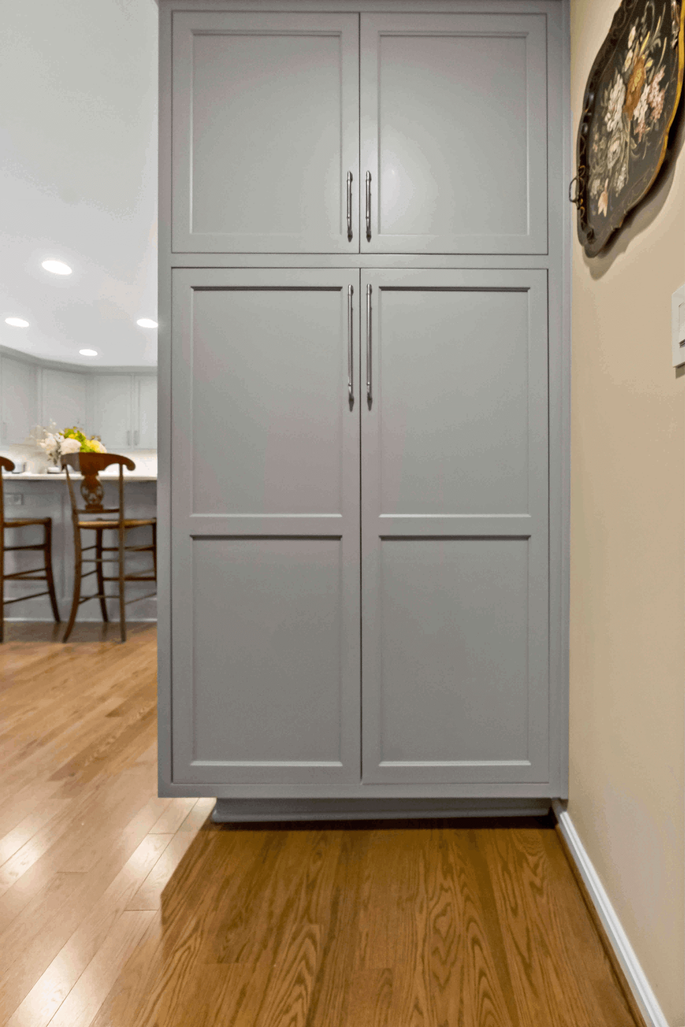 Light grey tall cabinets in kitchen remodel