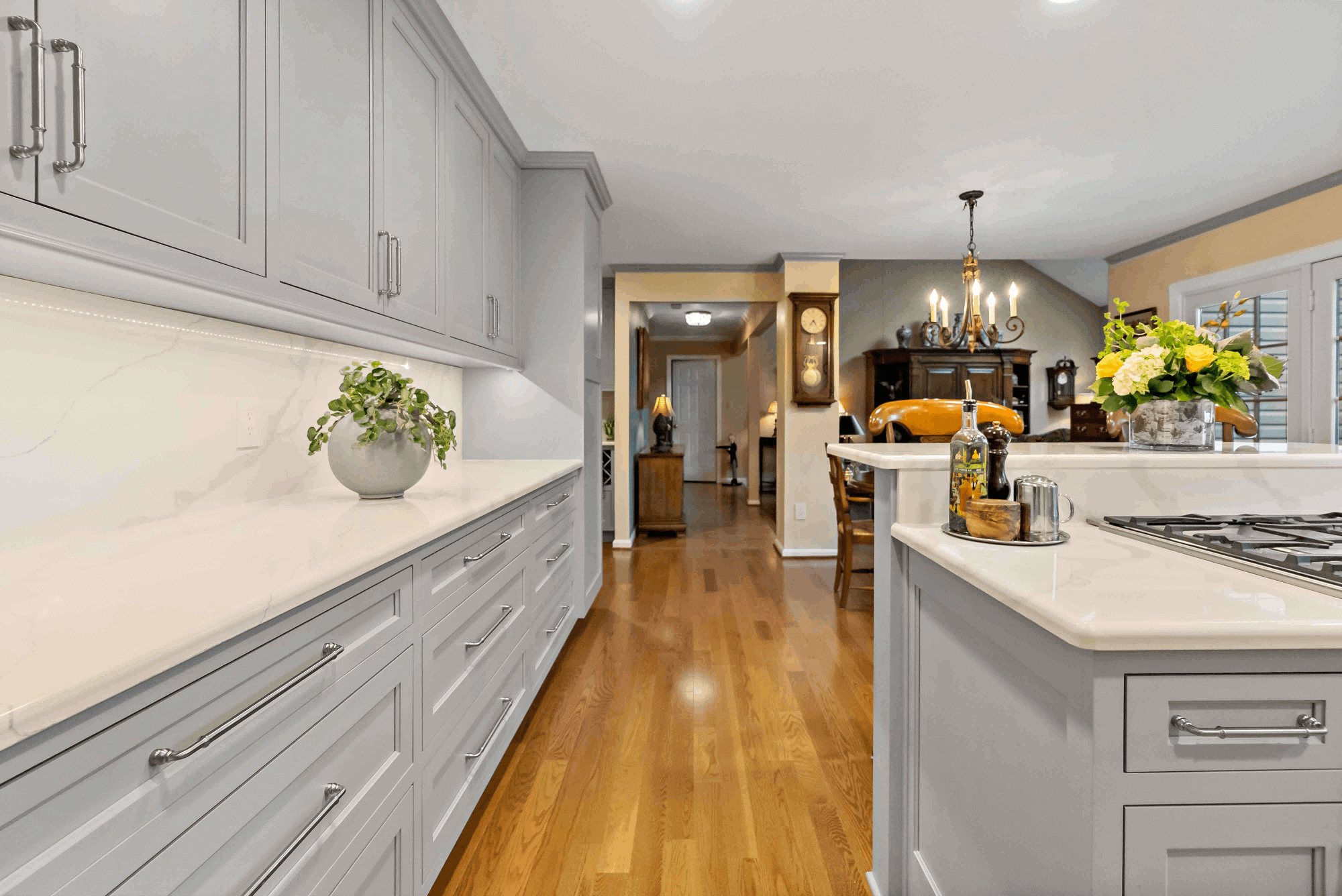 Marble white backsplash and countertops in kitchen