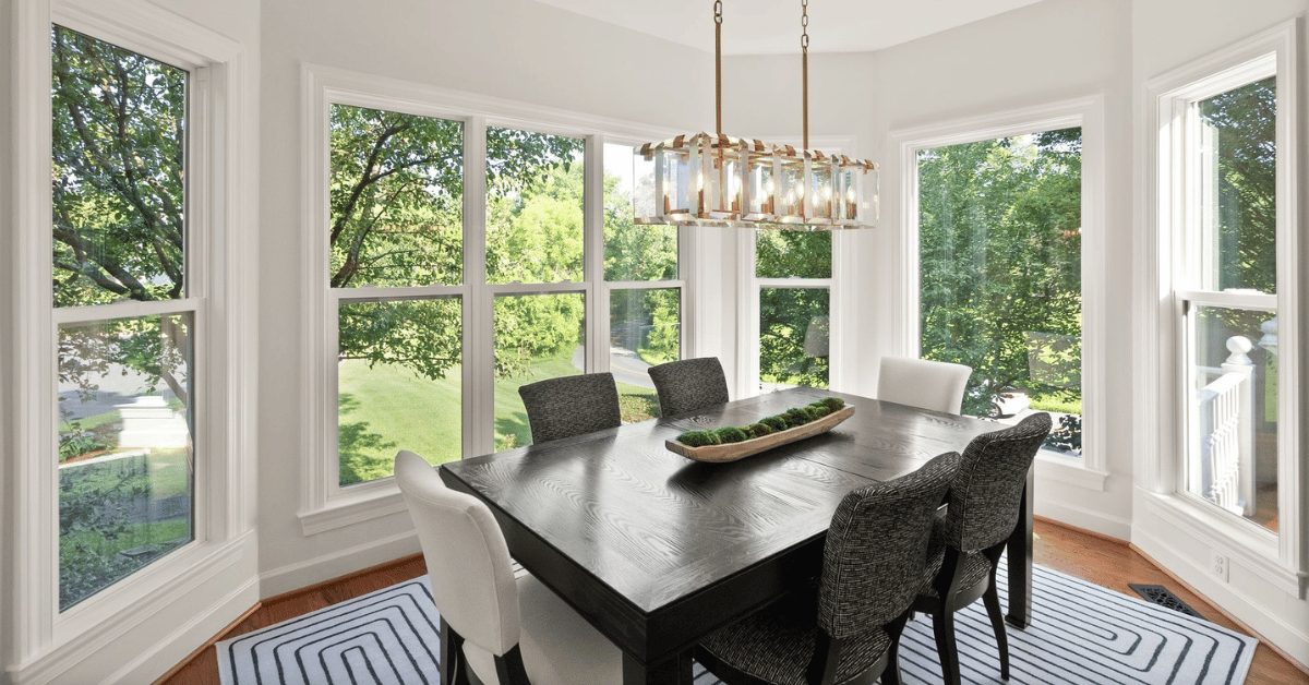 After: stunning dining room with large windows 