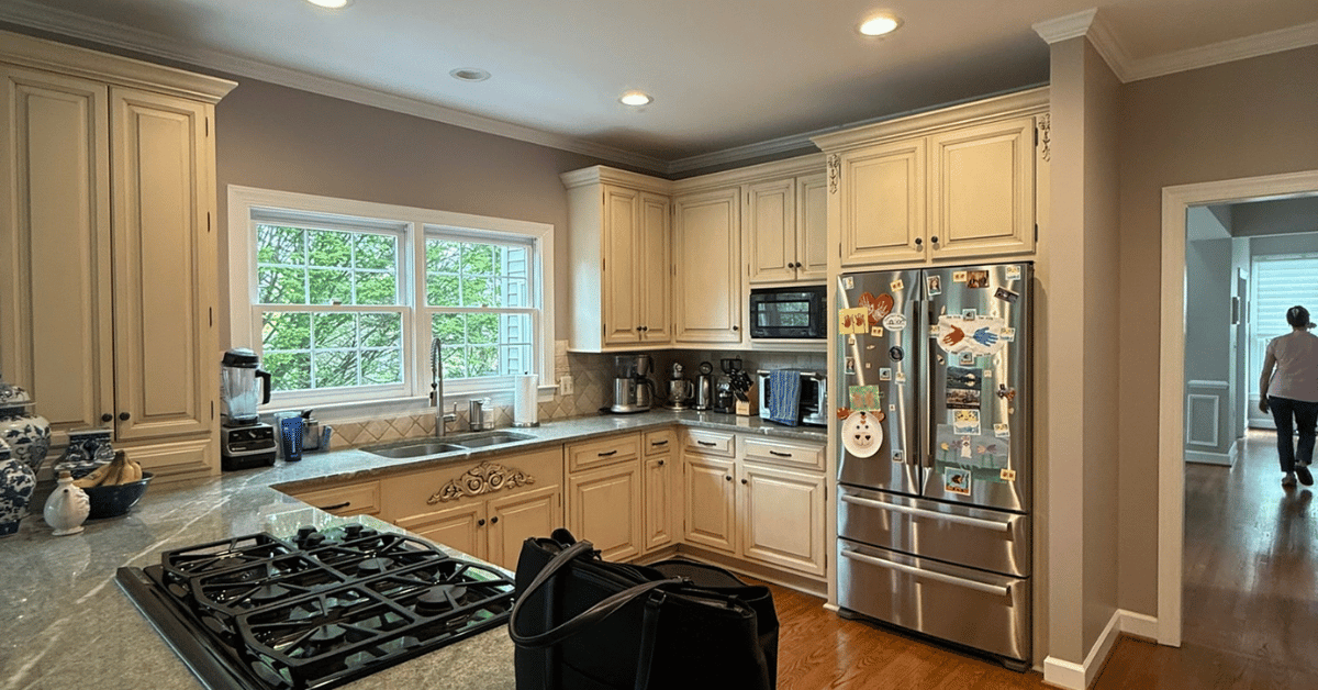 Before: dark, closed off kitchen