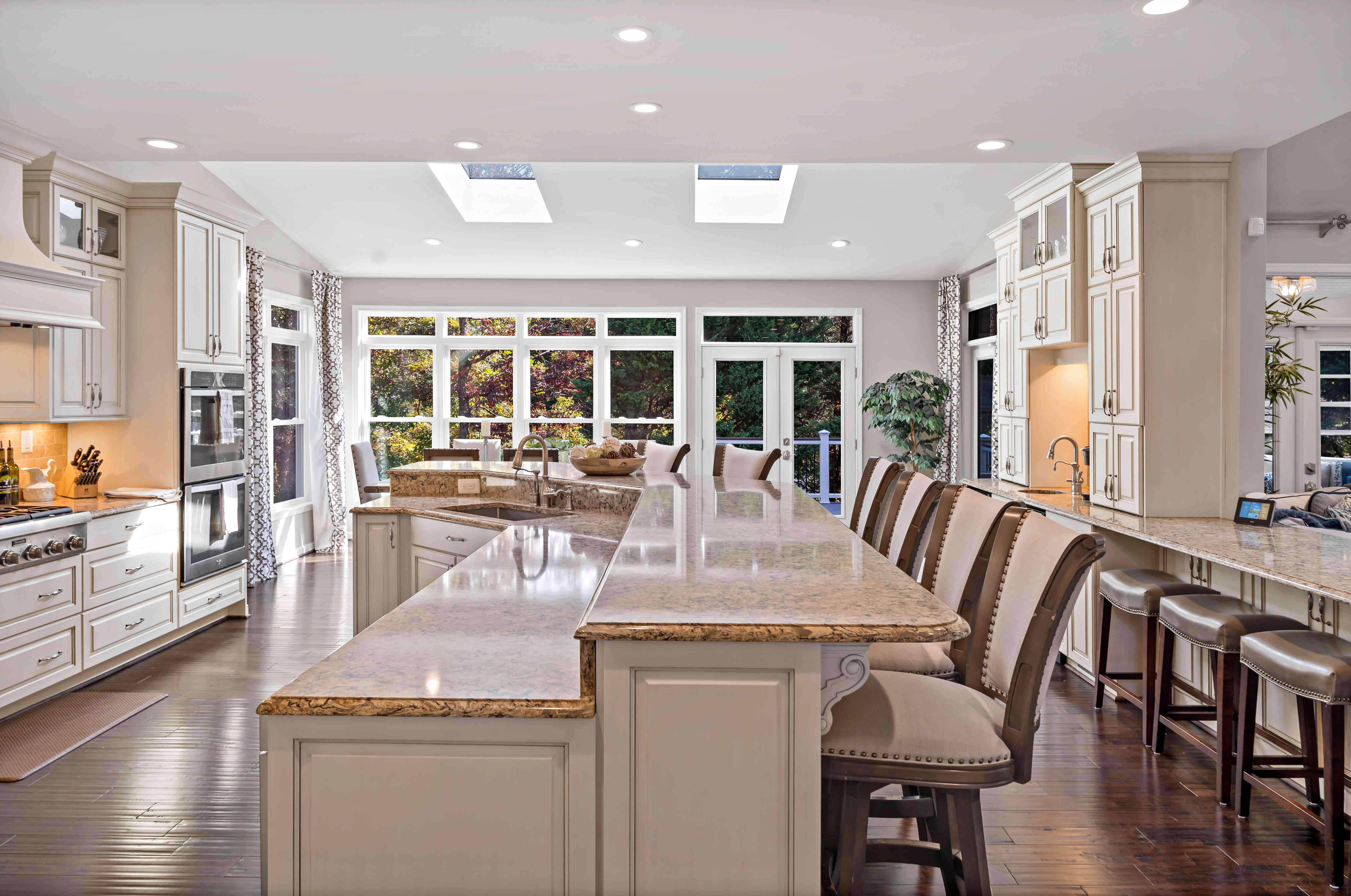 Two level kitchen island in cream colored Centreville kitchen