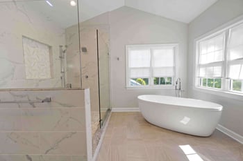 White Bathroom in McLean with freestanding Tub