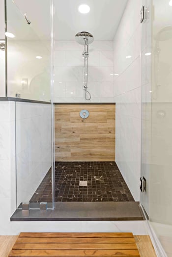 View of the shower with unique tiles