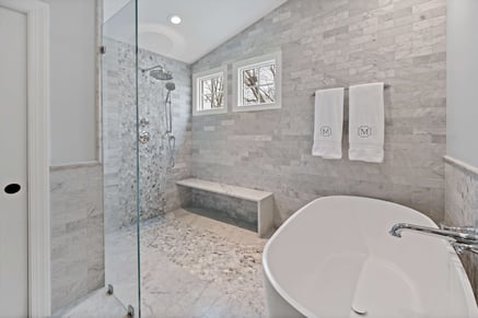 clean bathroom remodel with updated flooring