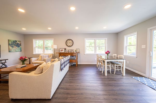 Living space with hard wood floors and seating for entertainment