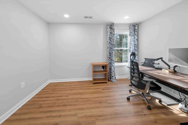 In home office space with hardwood floors