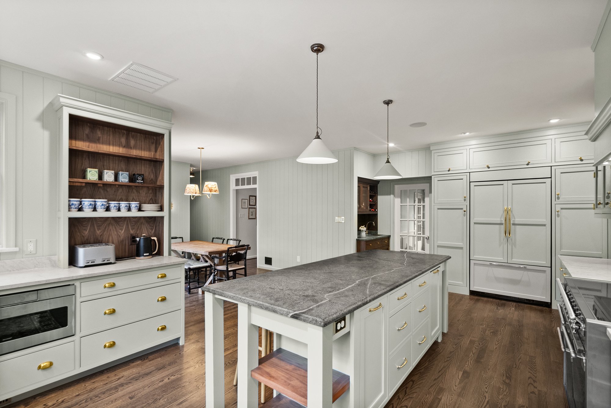 Great Falls, VA kitchen remodel with separate dining area, large kitchen island, and built-in refrigerator