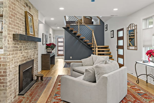 Living room with open staircase