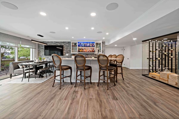 Basement bar seating with temperature-controlled wine room