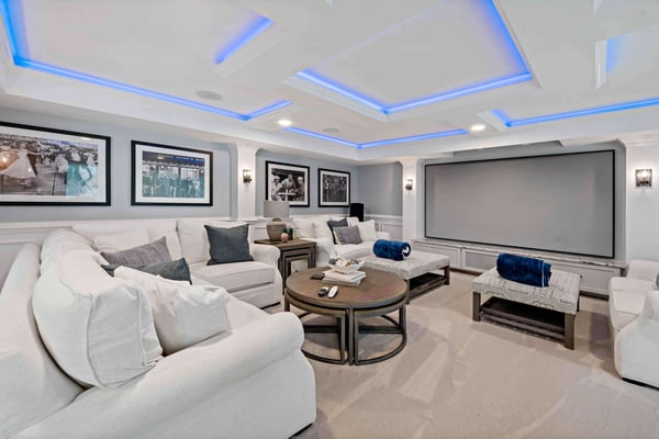 In house movie theater with blue ceiling lights