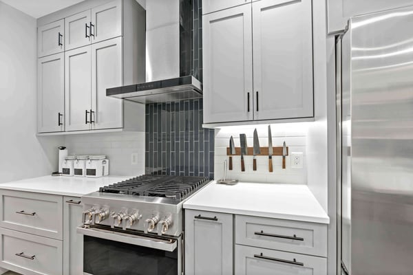 White kitchen with magnetic strip to hold knives