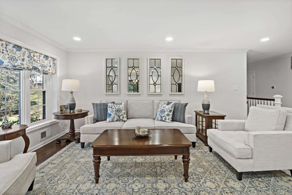 Cozy living room with dark wood traaditional furniture