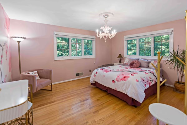 Light pink bedroom with chic velvet accents