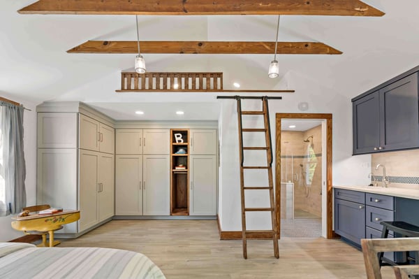 Studio style bedroom bathroom with wet bar and lofted storage accessed through ships ladder