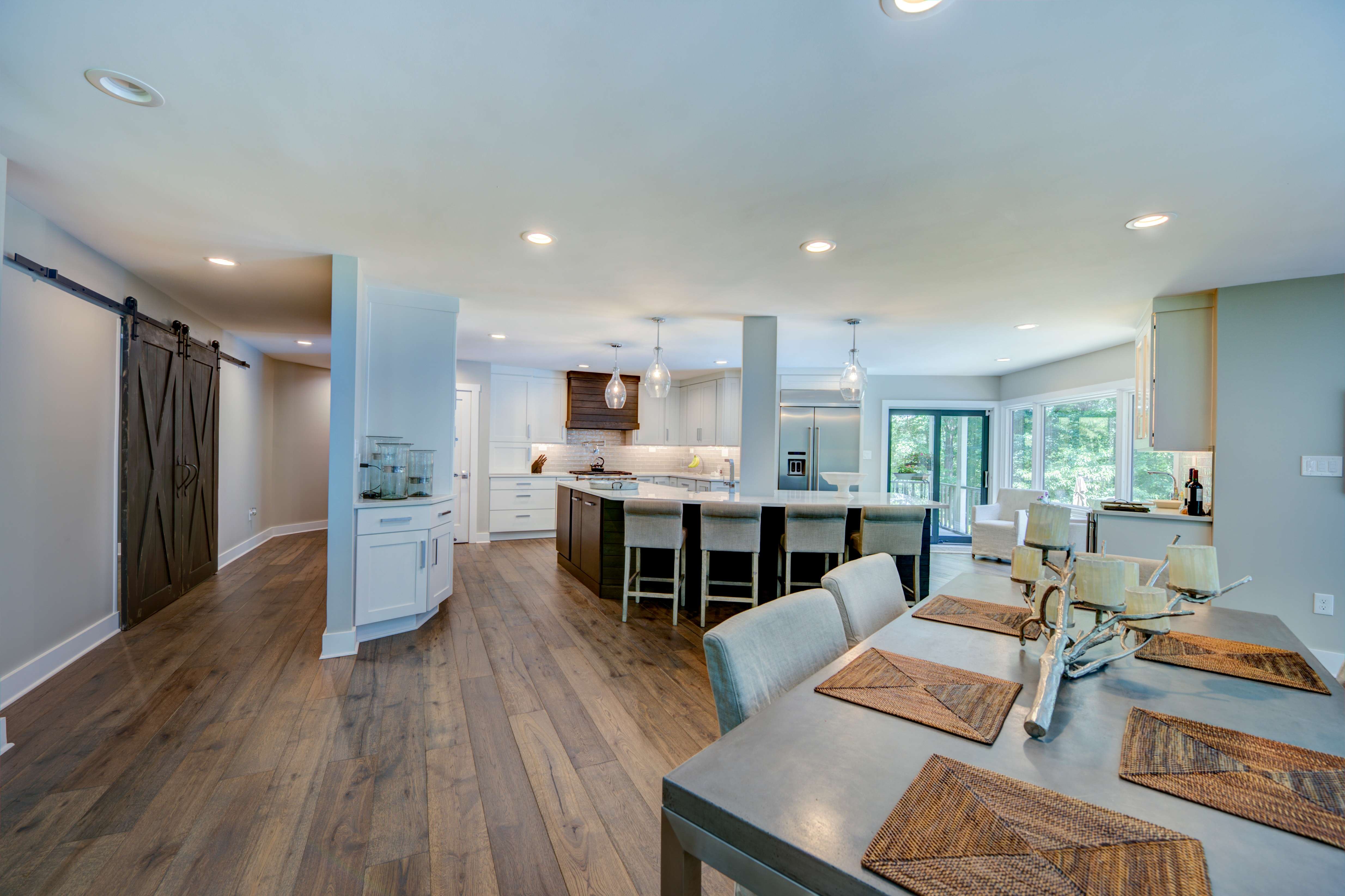Open spacious kitchen with dining table and kitchen island seating