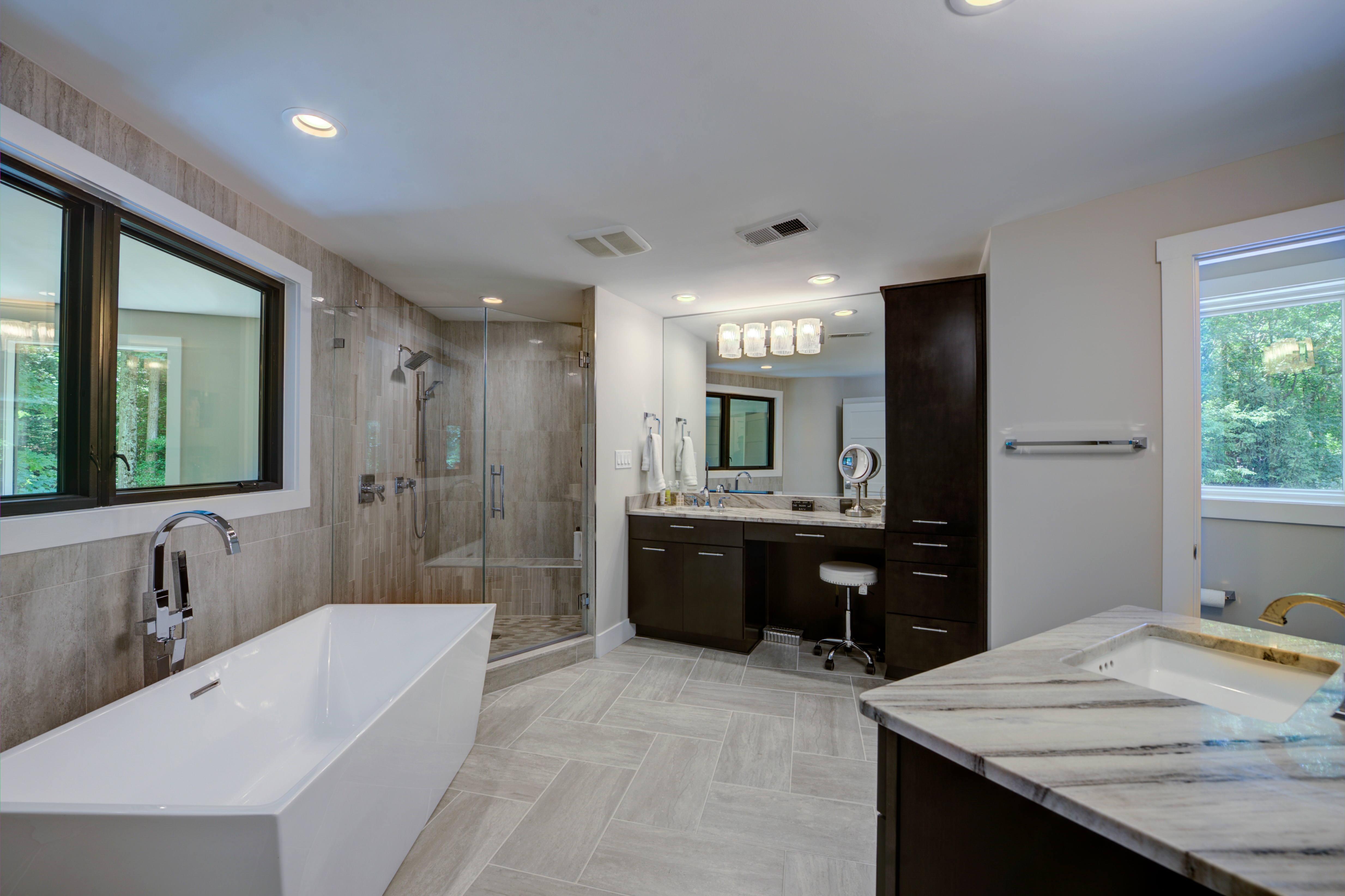 Master bathroom with stand-alone bathtub and walk-in shower