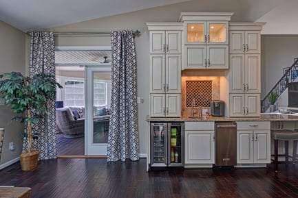 Kitchen cabinet storage leading to backyard porch