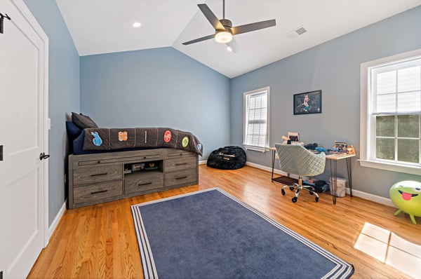 Second floor bedroom addition with cathedral ceiling
