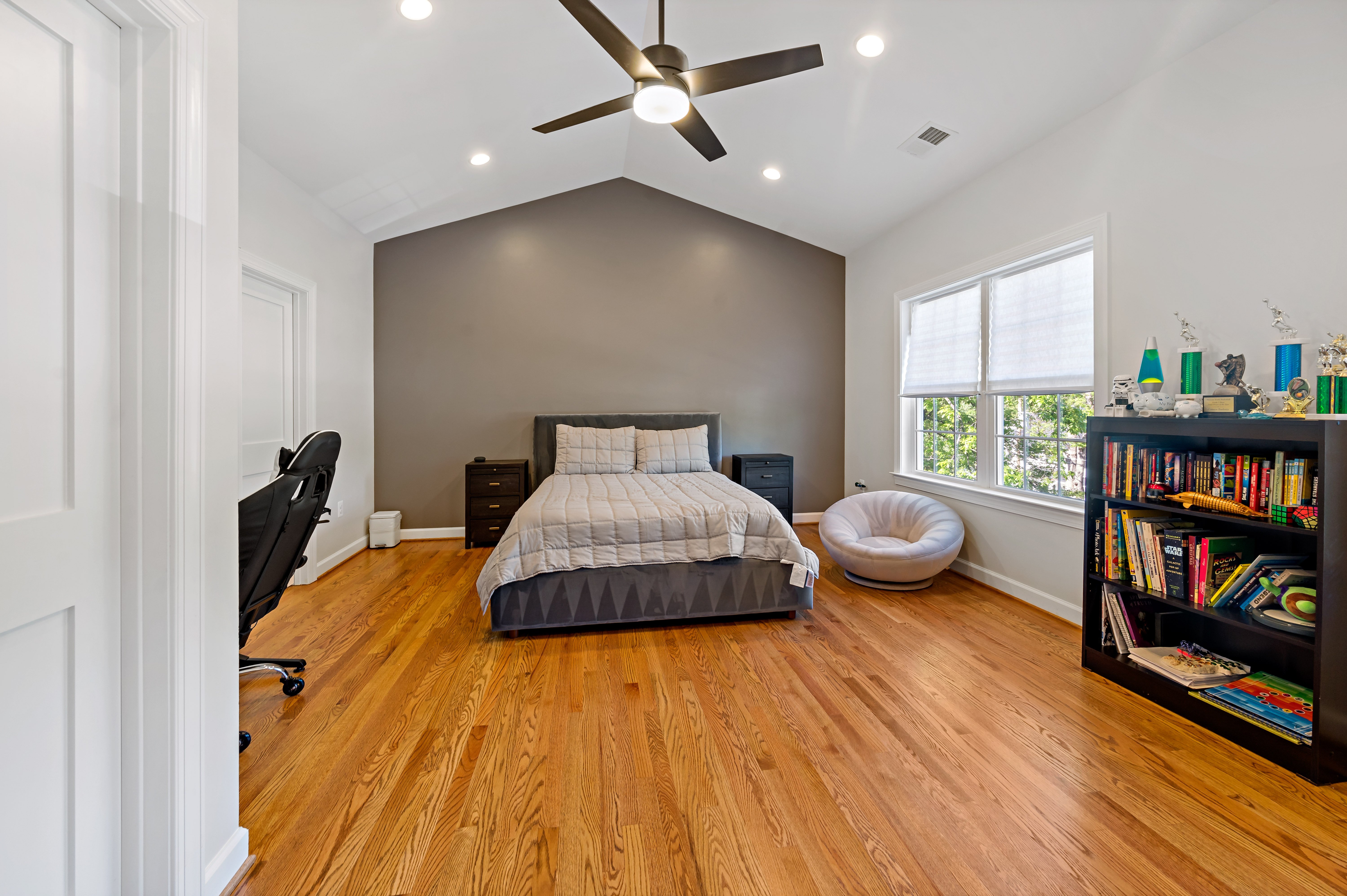 Spacious bedroom addition with cathedral ceiling and hard wood floors