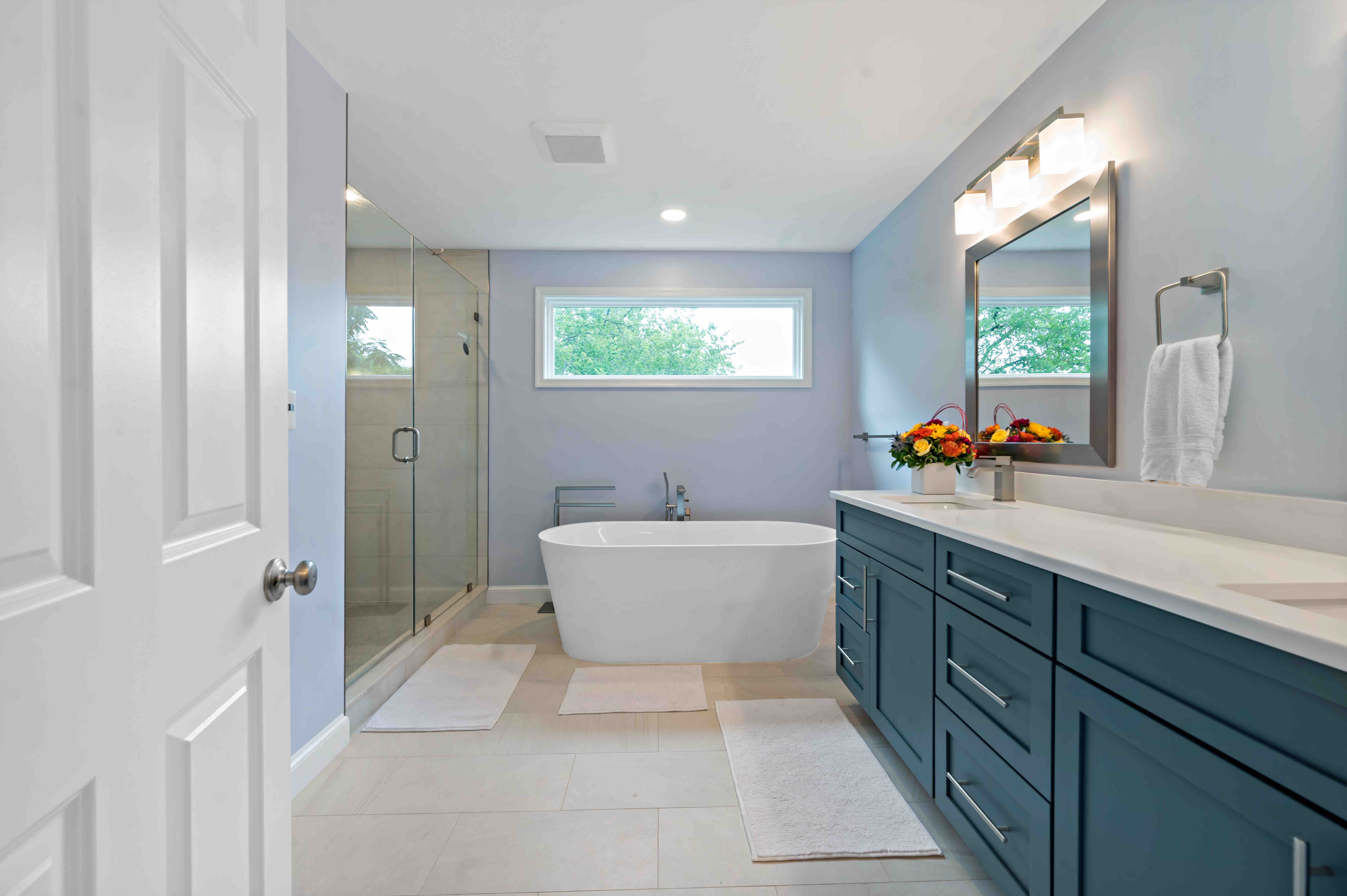 Large full bathroom with stand-alone walk-in shower and bathtub