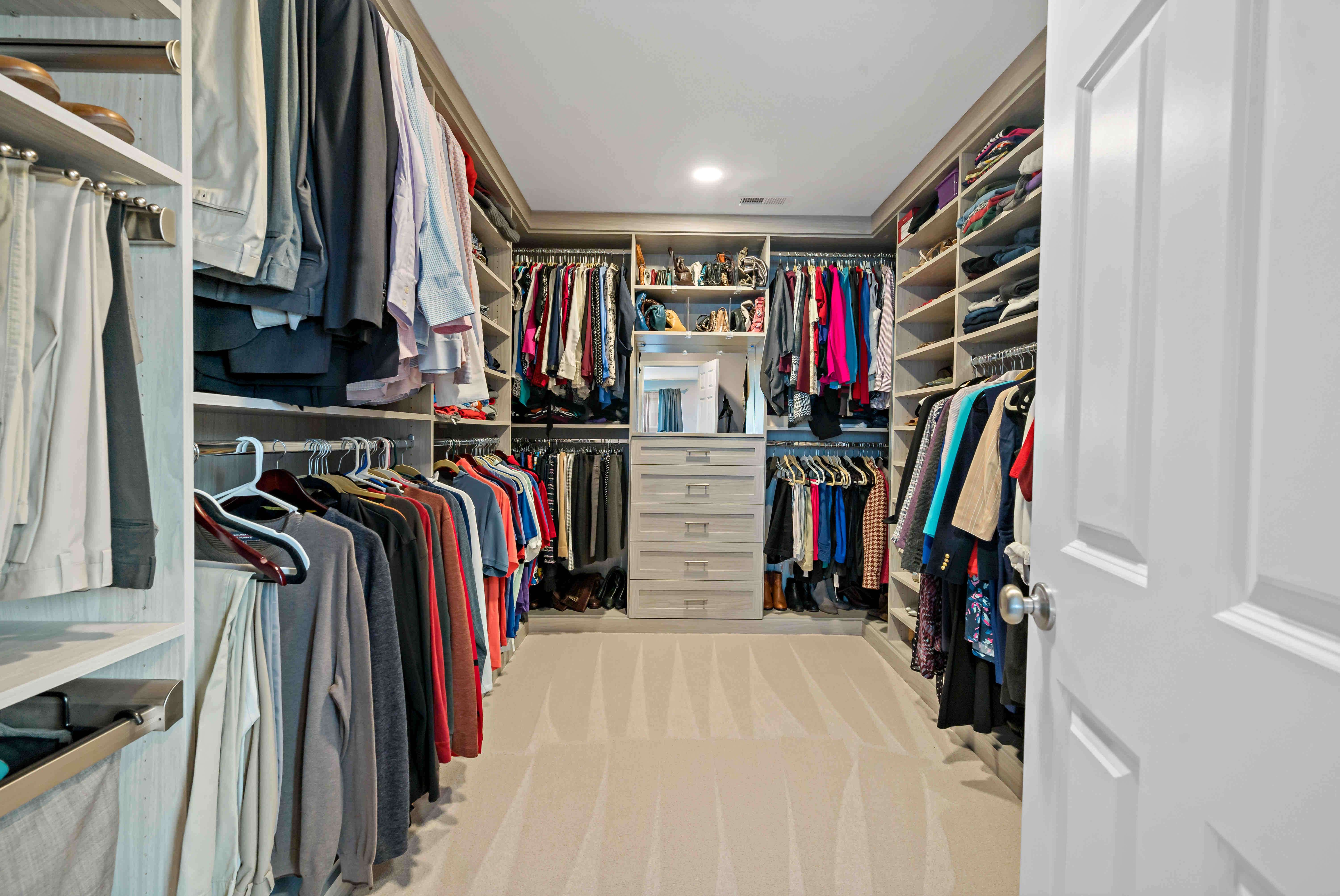 Large walk-in closet with ample storage space