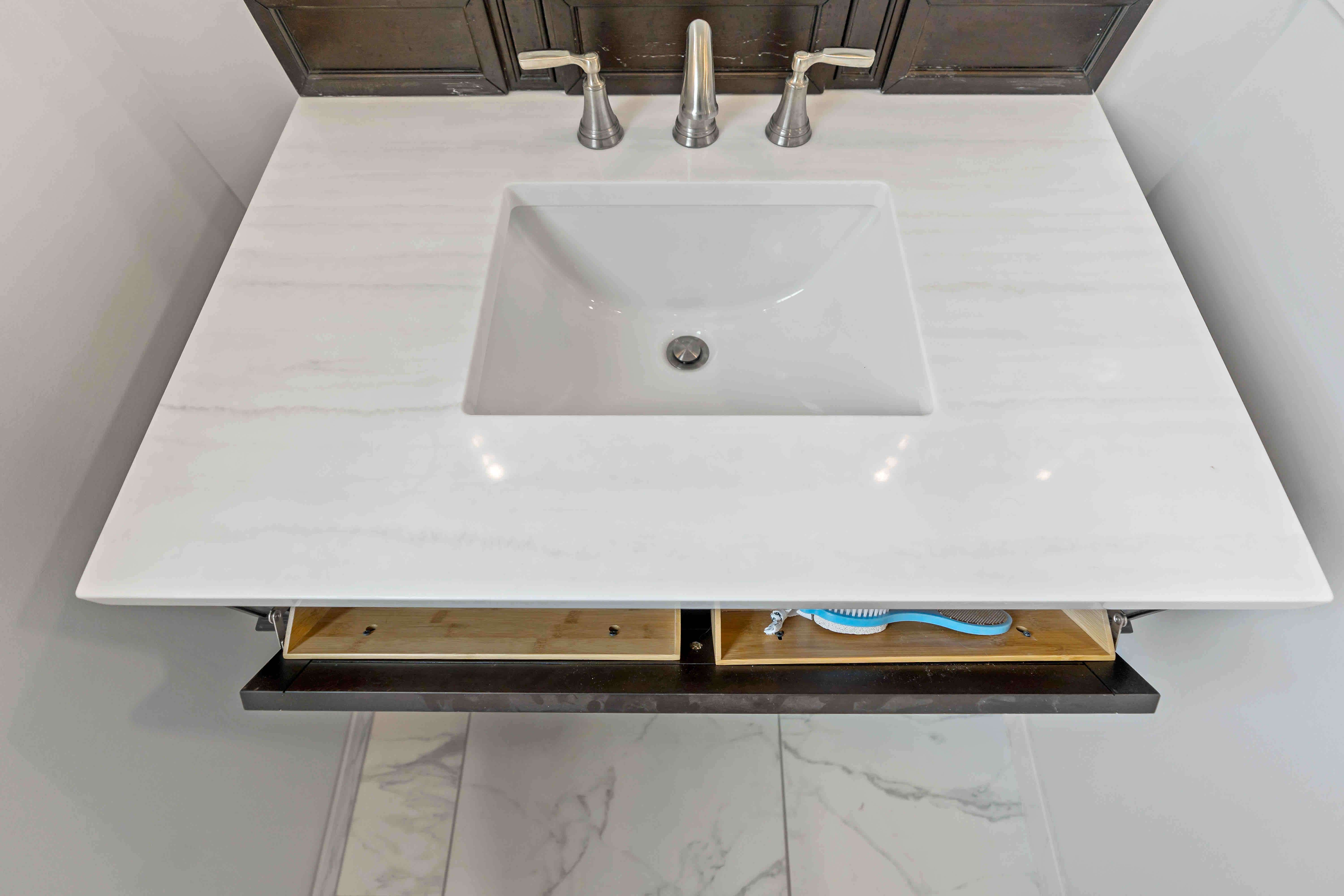 White countertop and sink in bathroom vanity