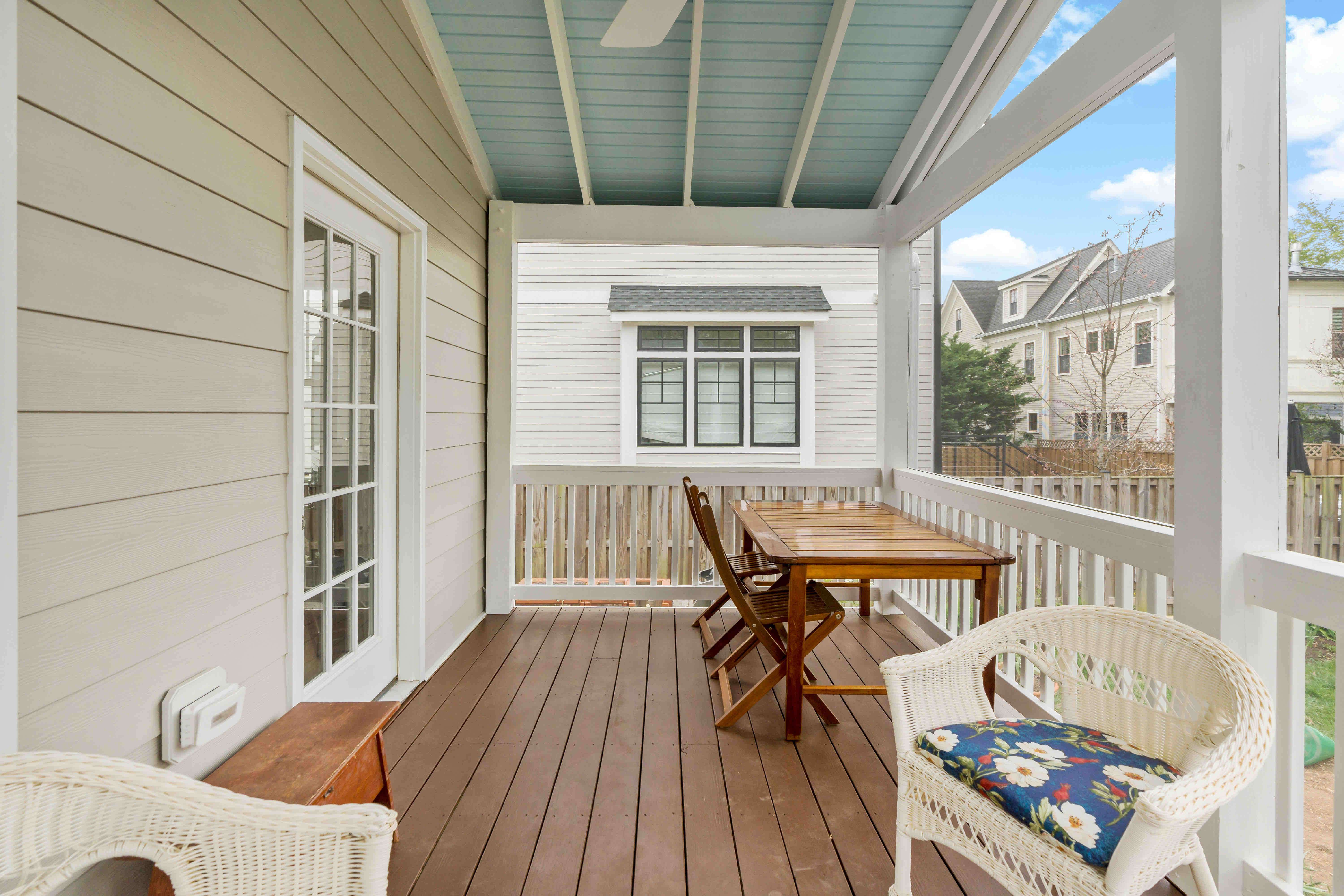 Screened porch addition on Arlington home with roof