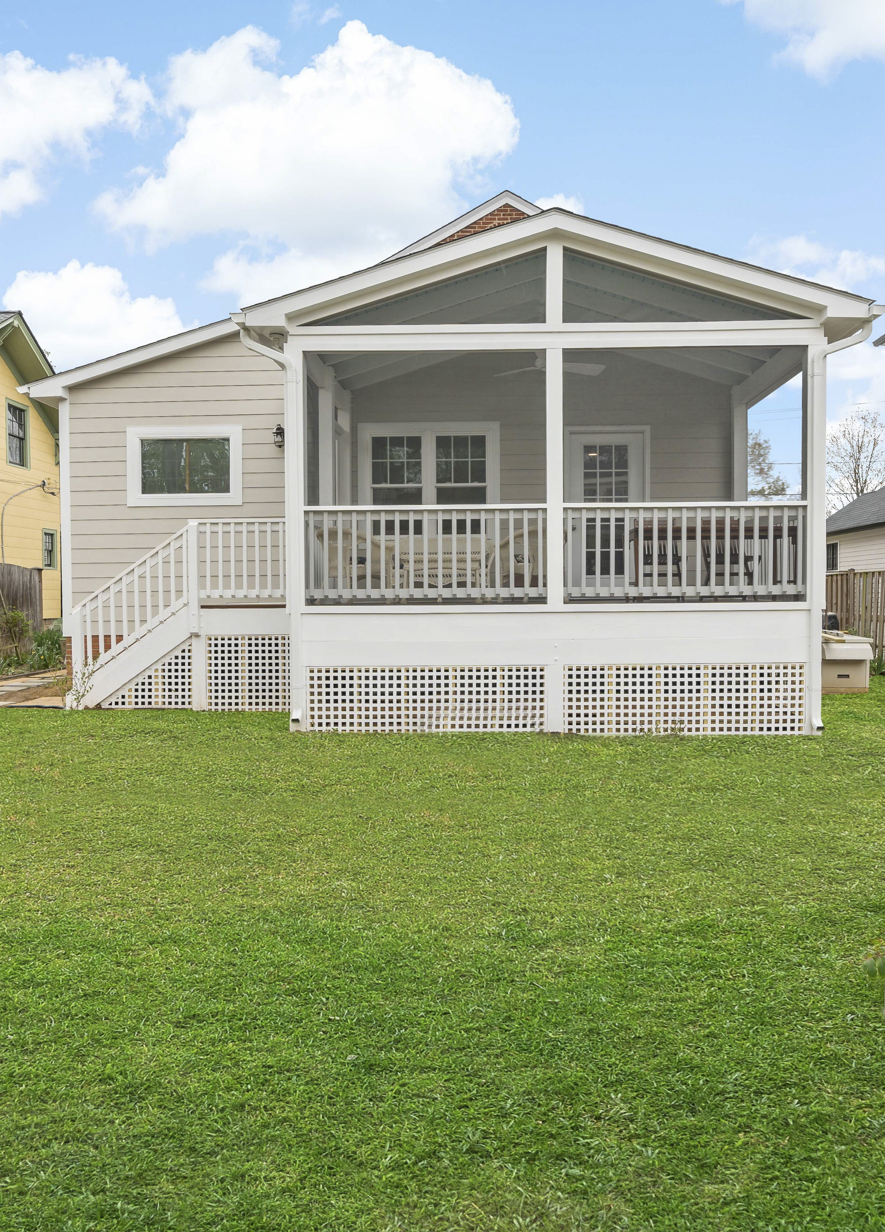 Raised screened porch with roof