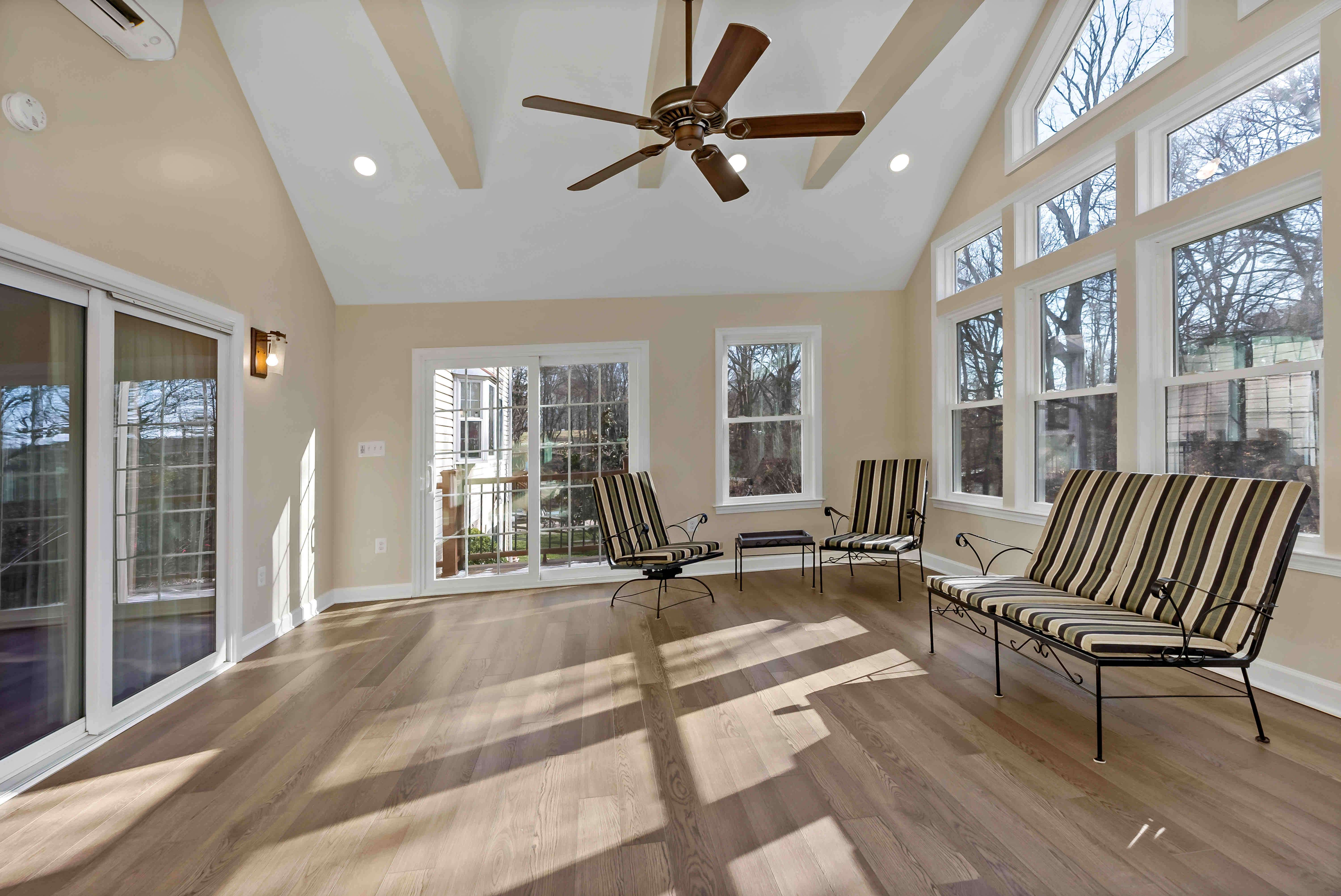 Ceiling fan and large windows in light-fillled multi-purpose room