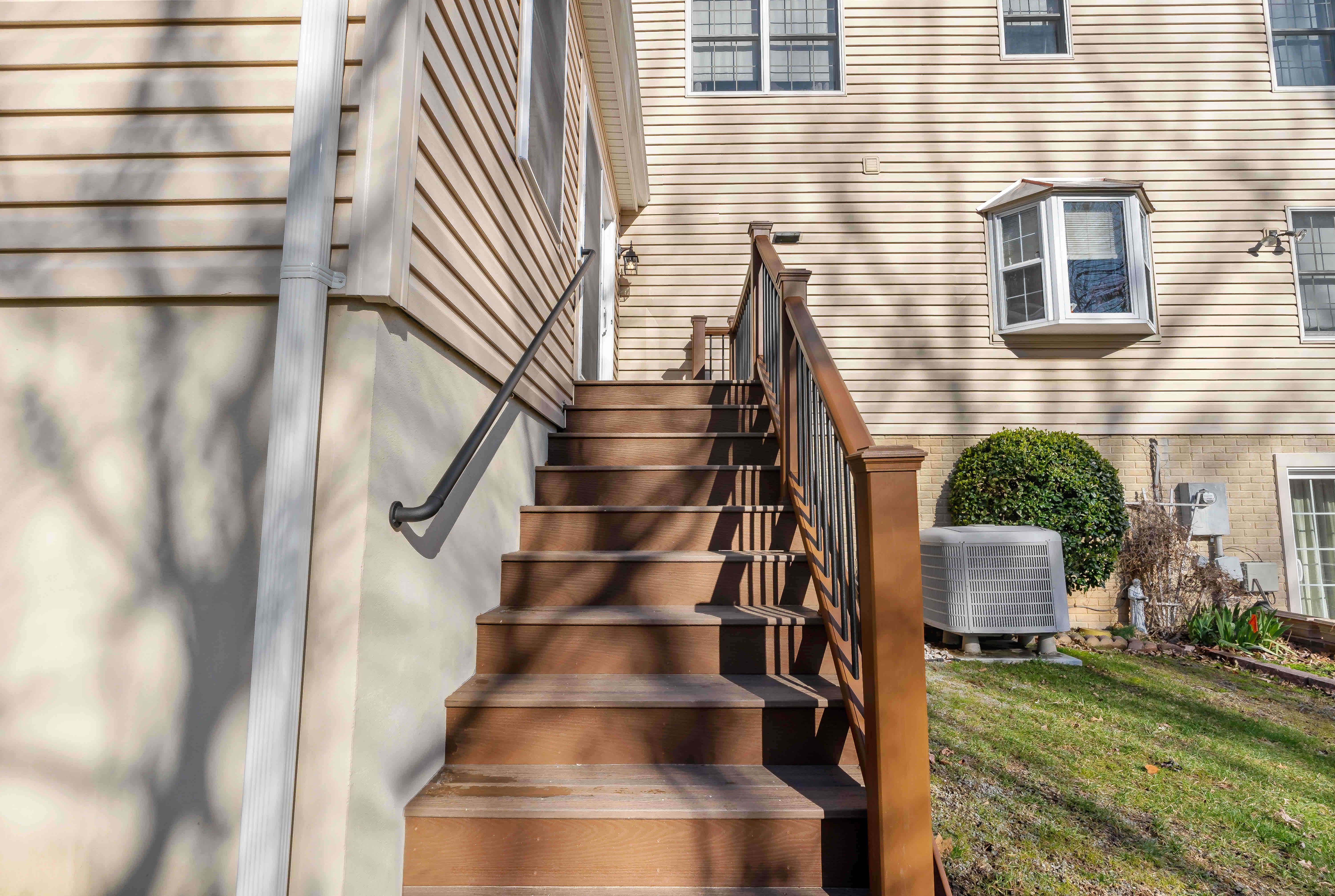 Stairs on side of sunroom to enter and exit room