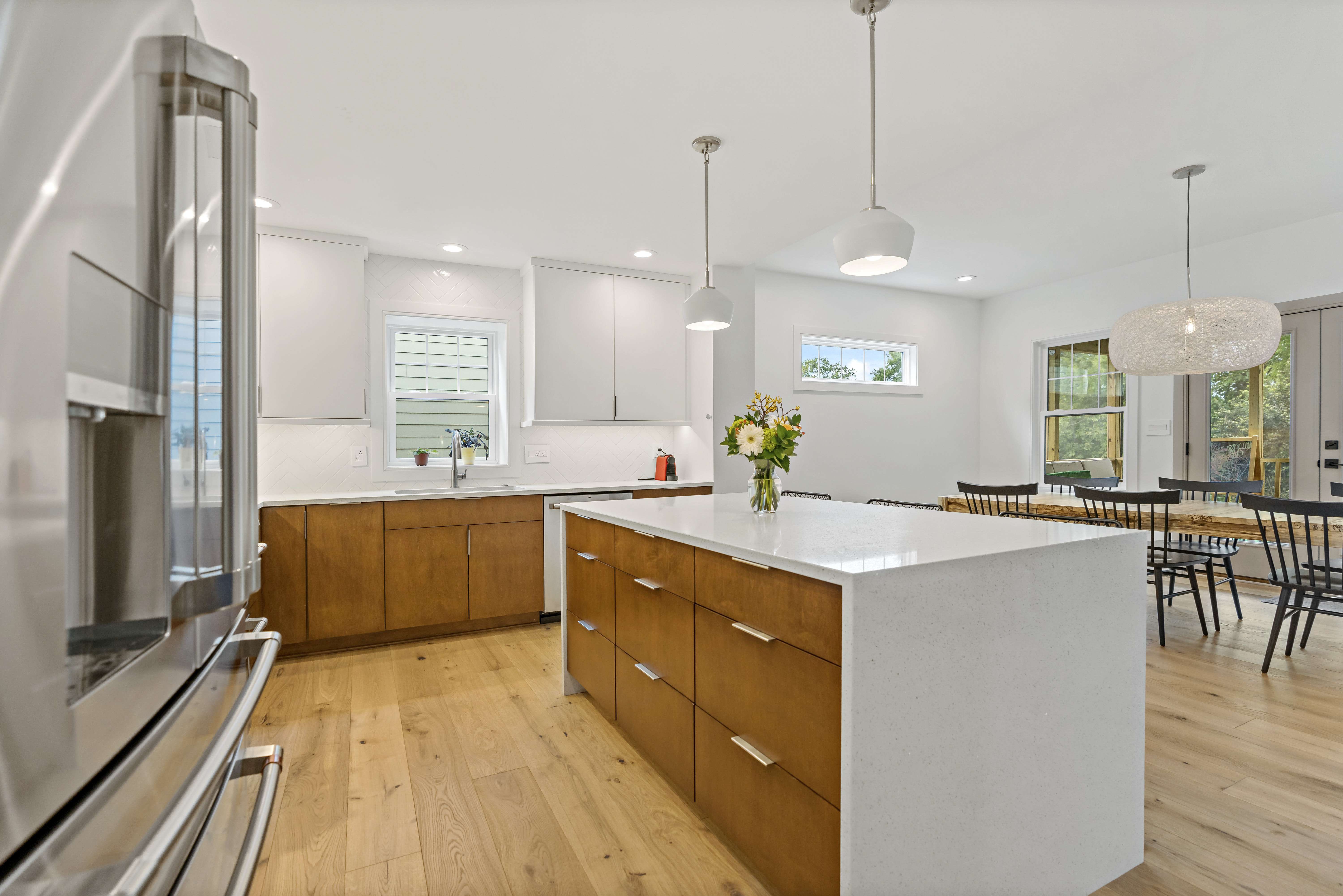 Brown wood drawers with white countertop kitchen island