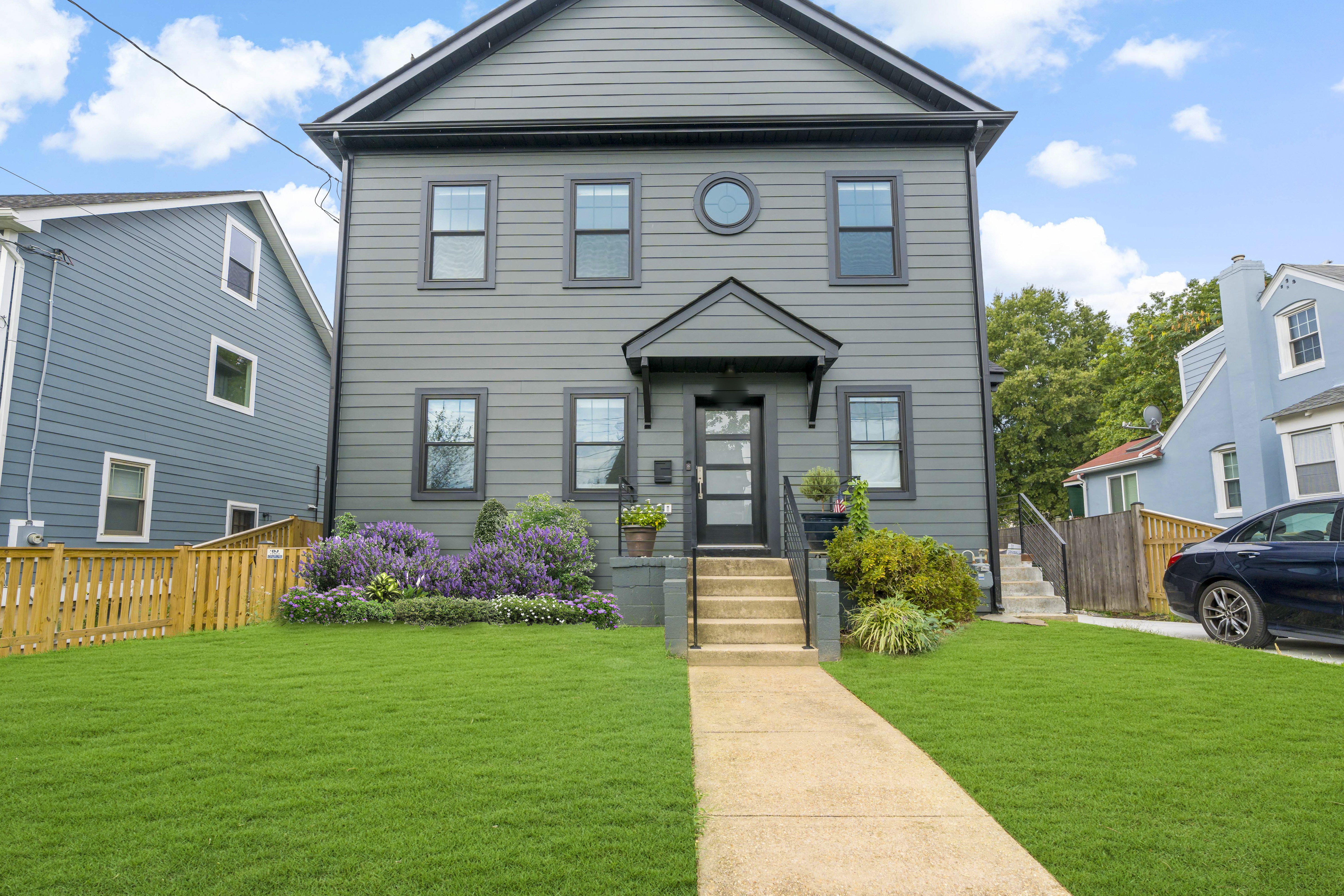 Exterior view of front of Arlington home after addition remodel