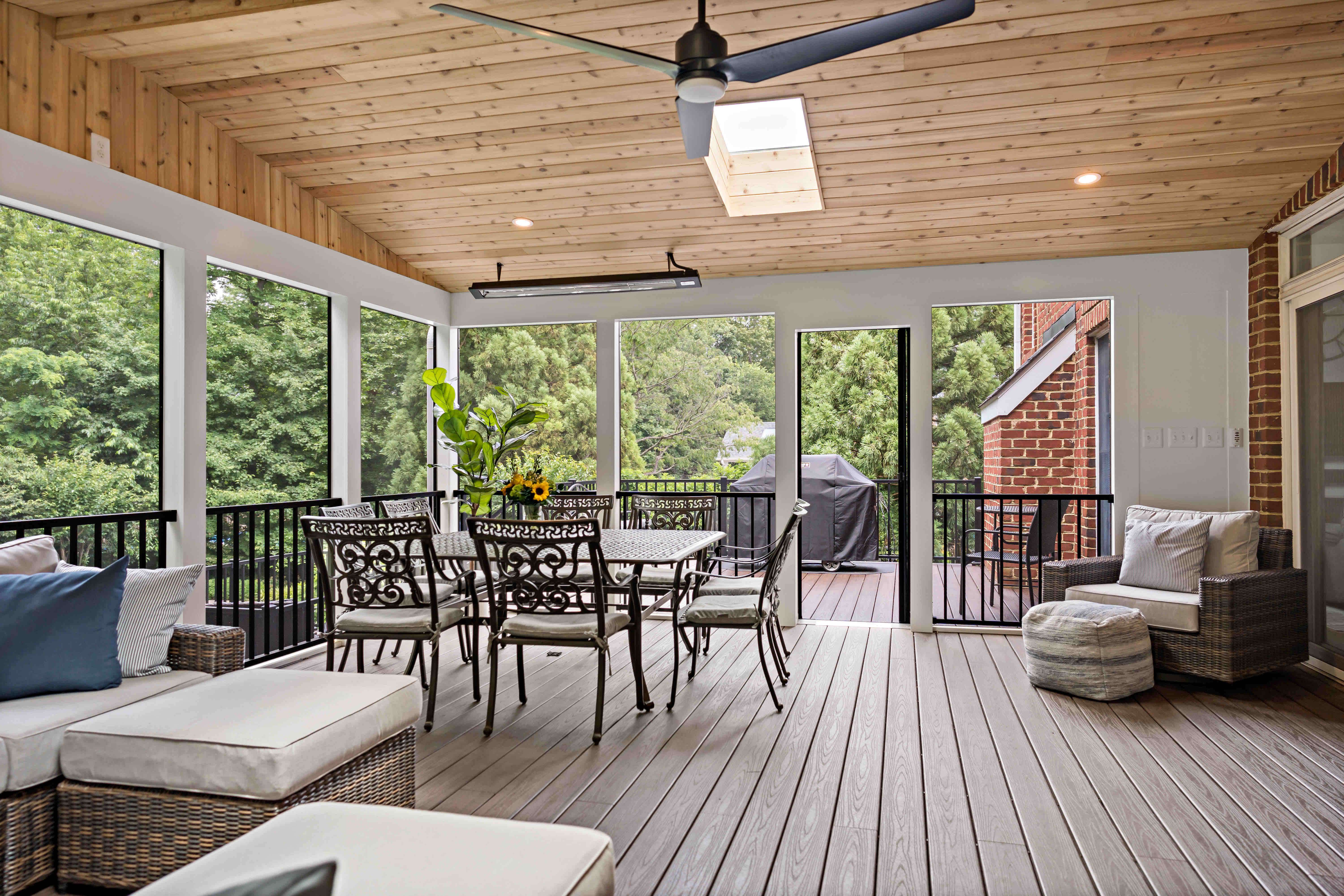Screened porch with skylight window and ceiling fan