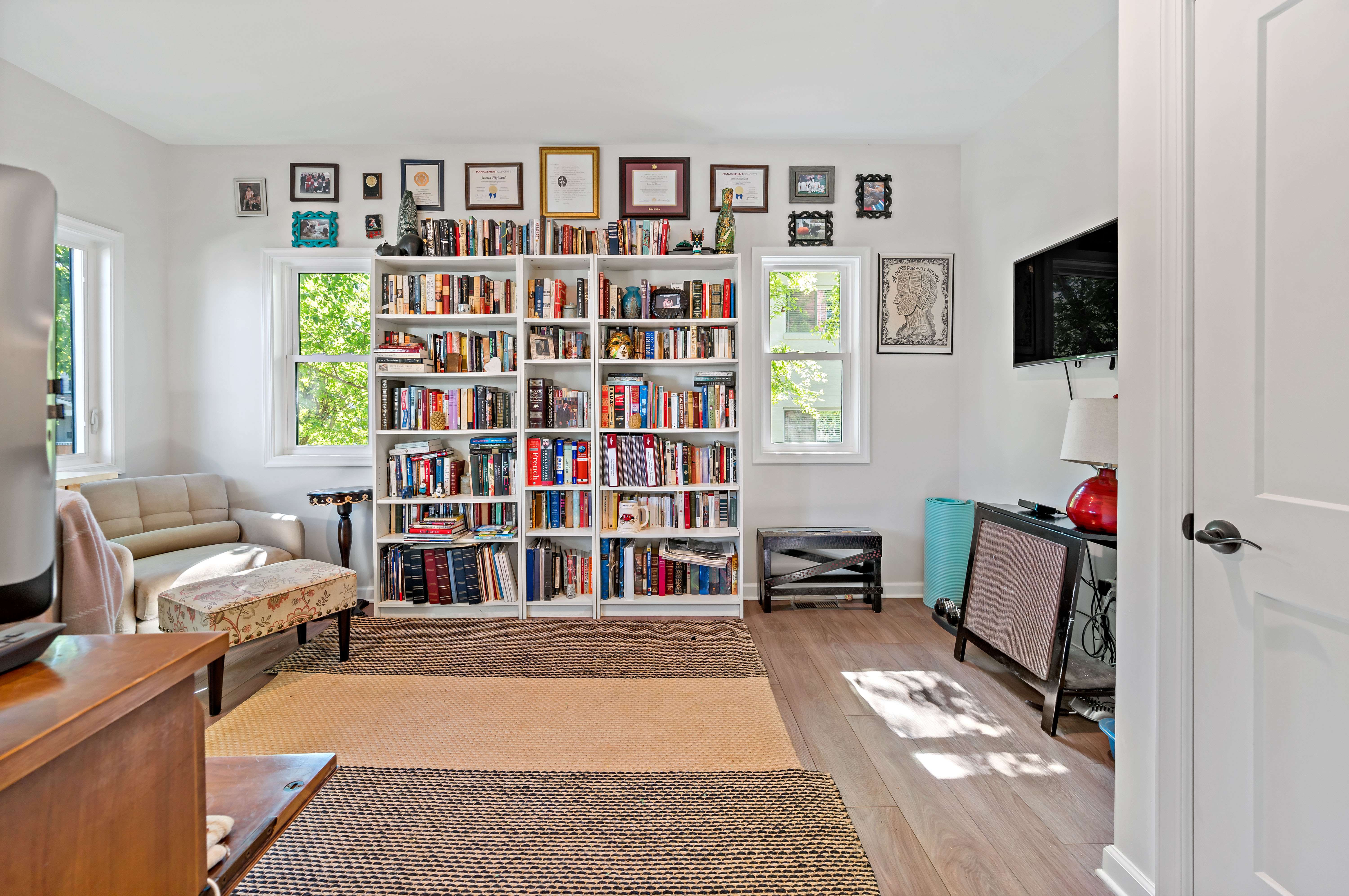 Built In Bookcase and hardwood floors in living space