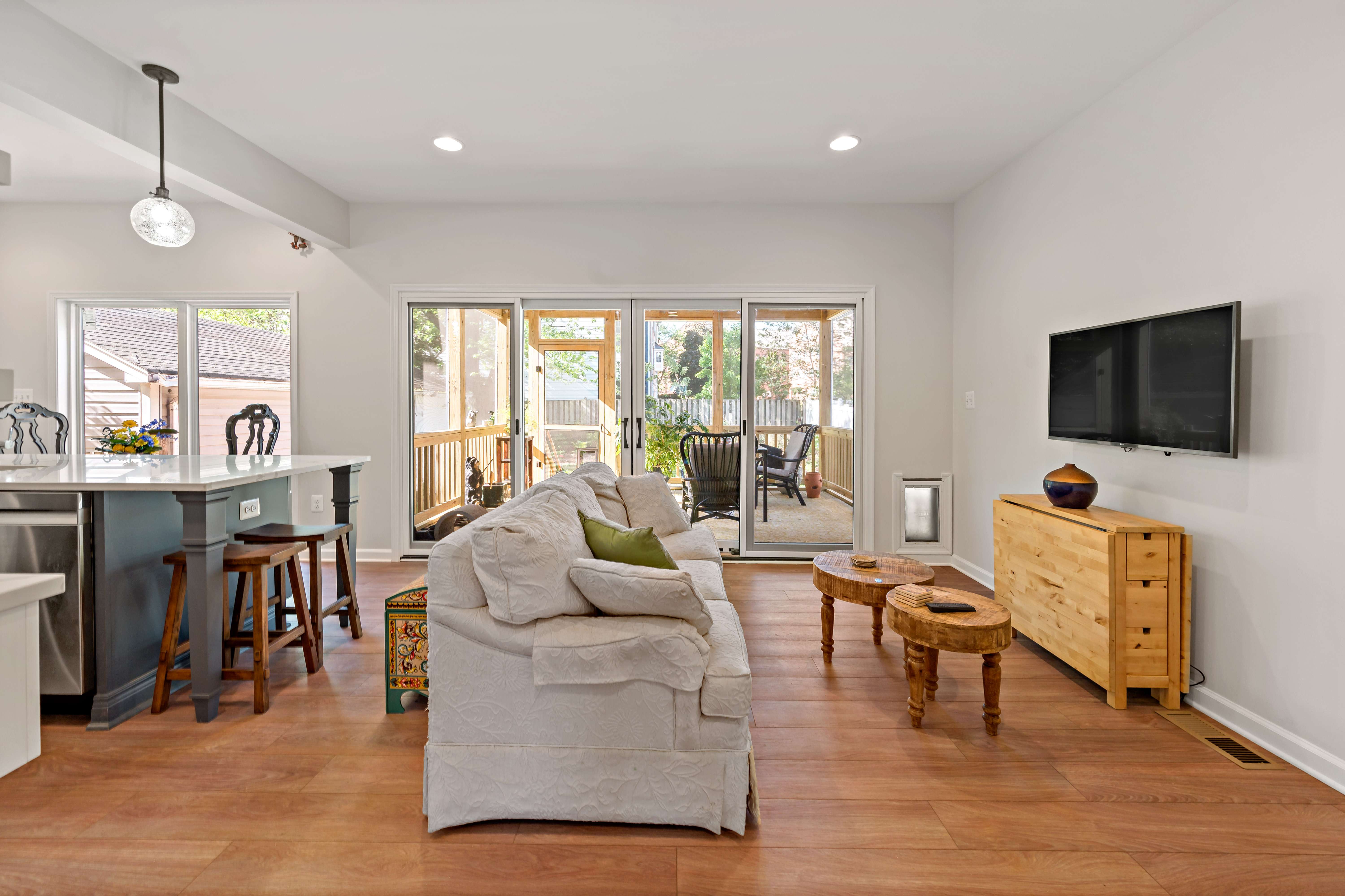 Hard wood floor kitchen and living room open concept