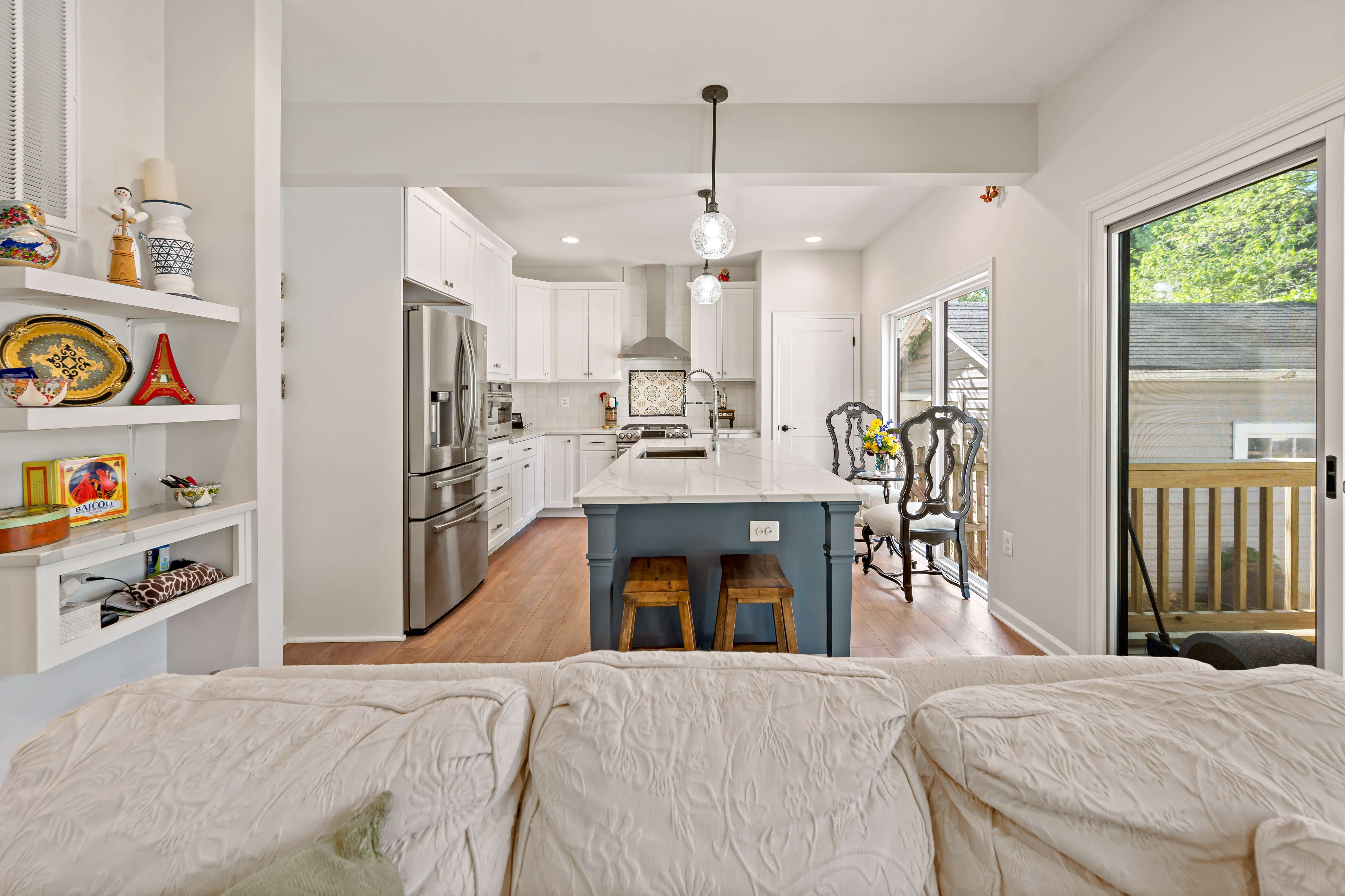 Living Room Kitchen Transition with blue island