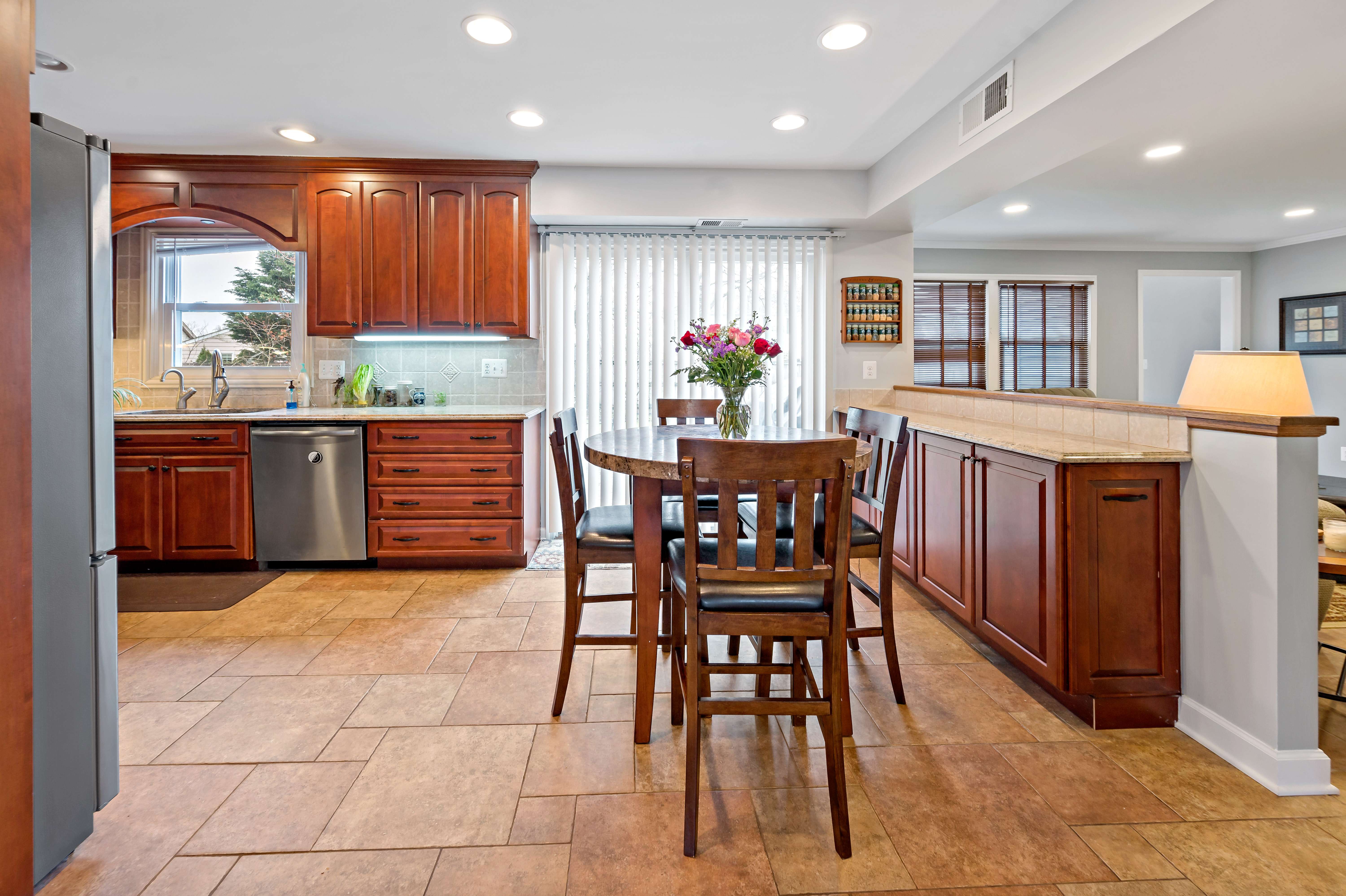 Brown tile floors in kitchen area