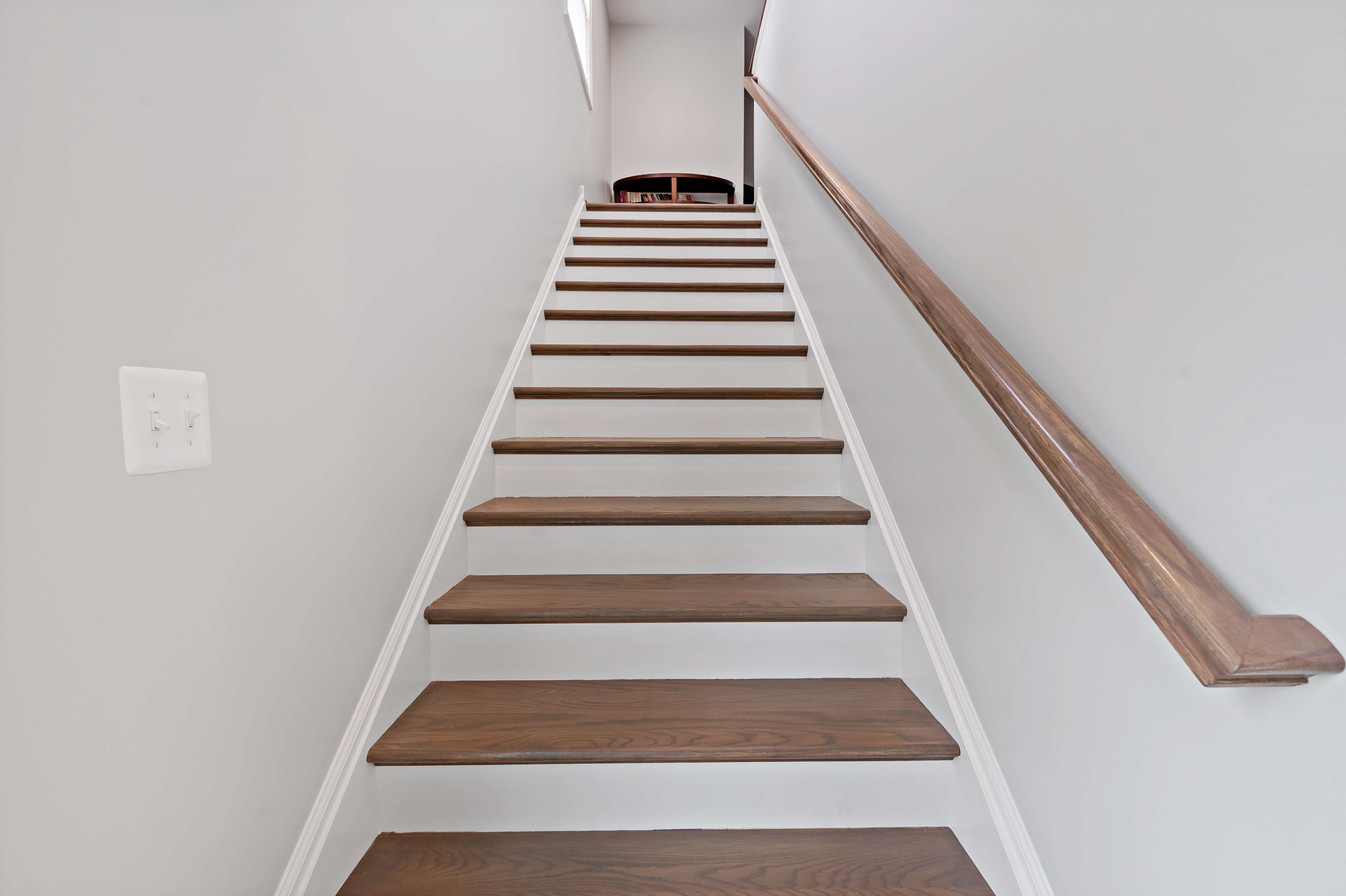 Brown and white wooden staircase