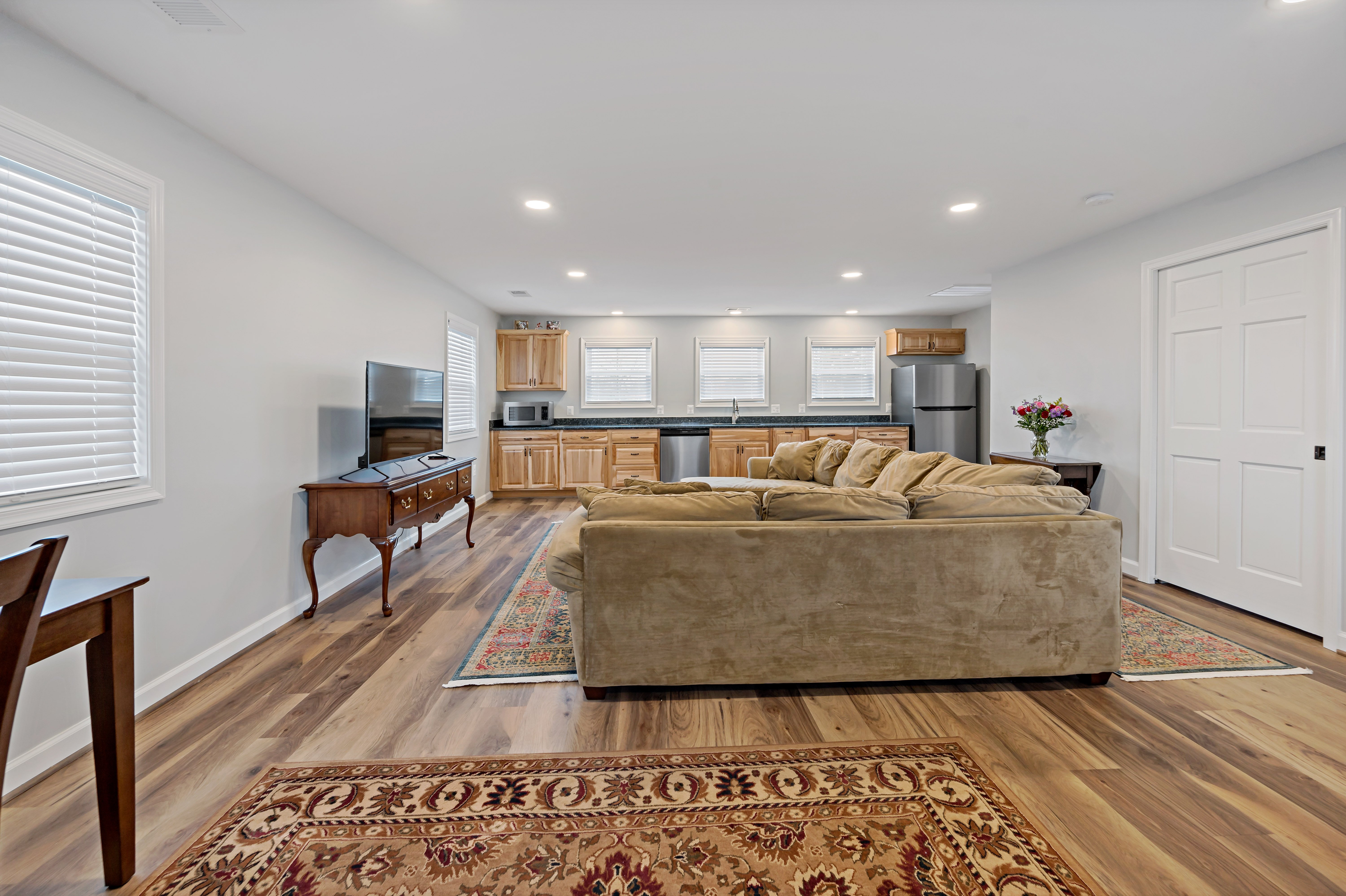 Multicolored brown flooring in sitting area