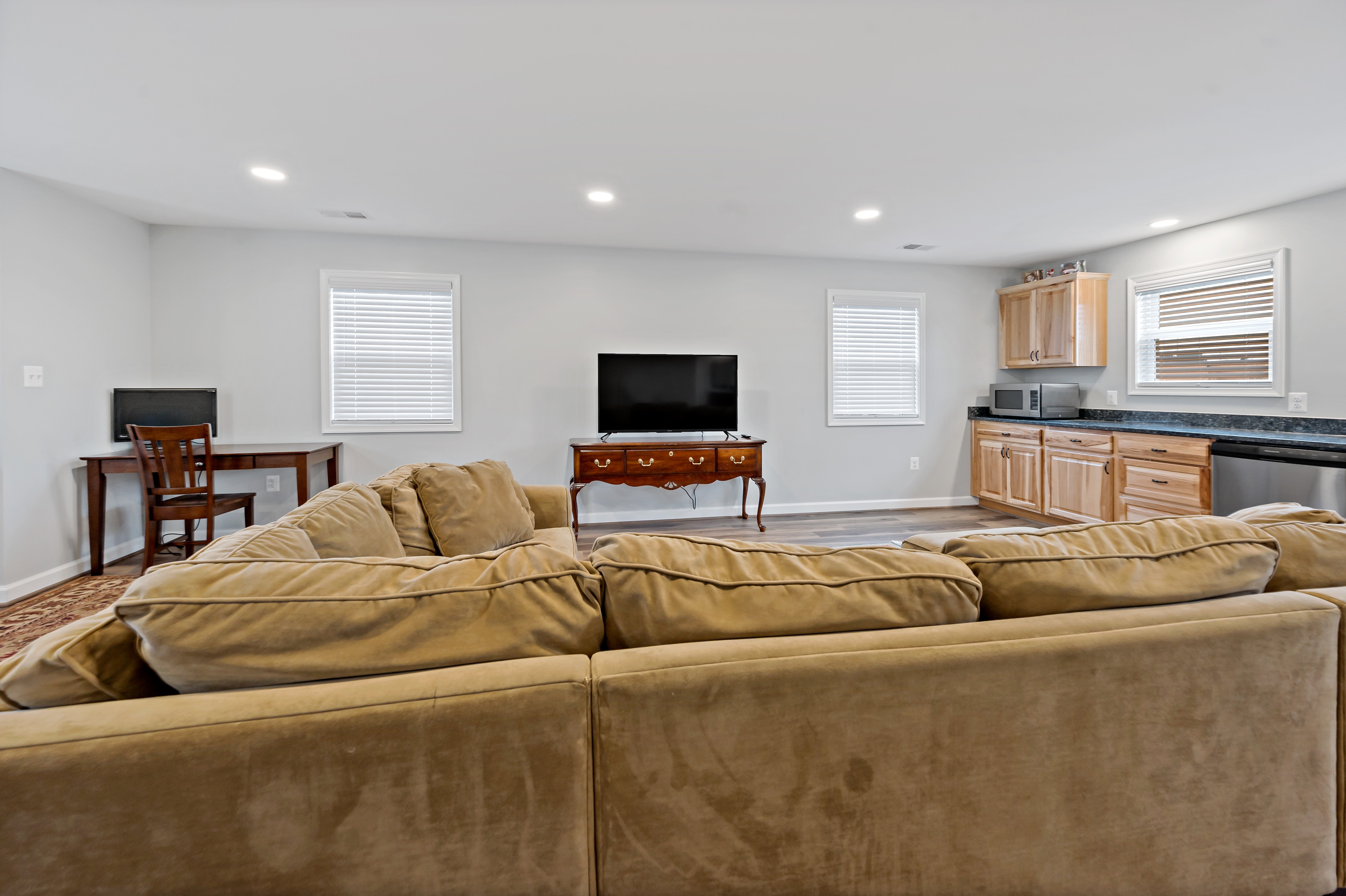 Living room with small round ceiling lights