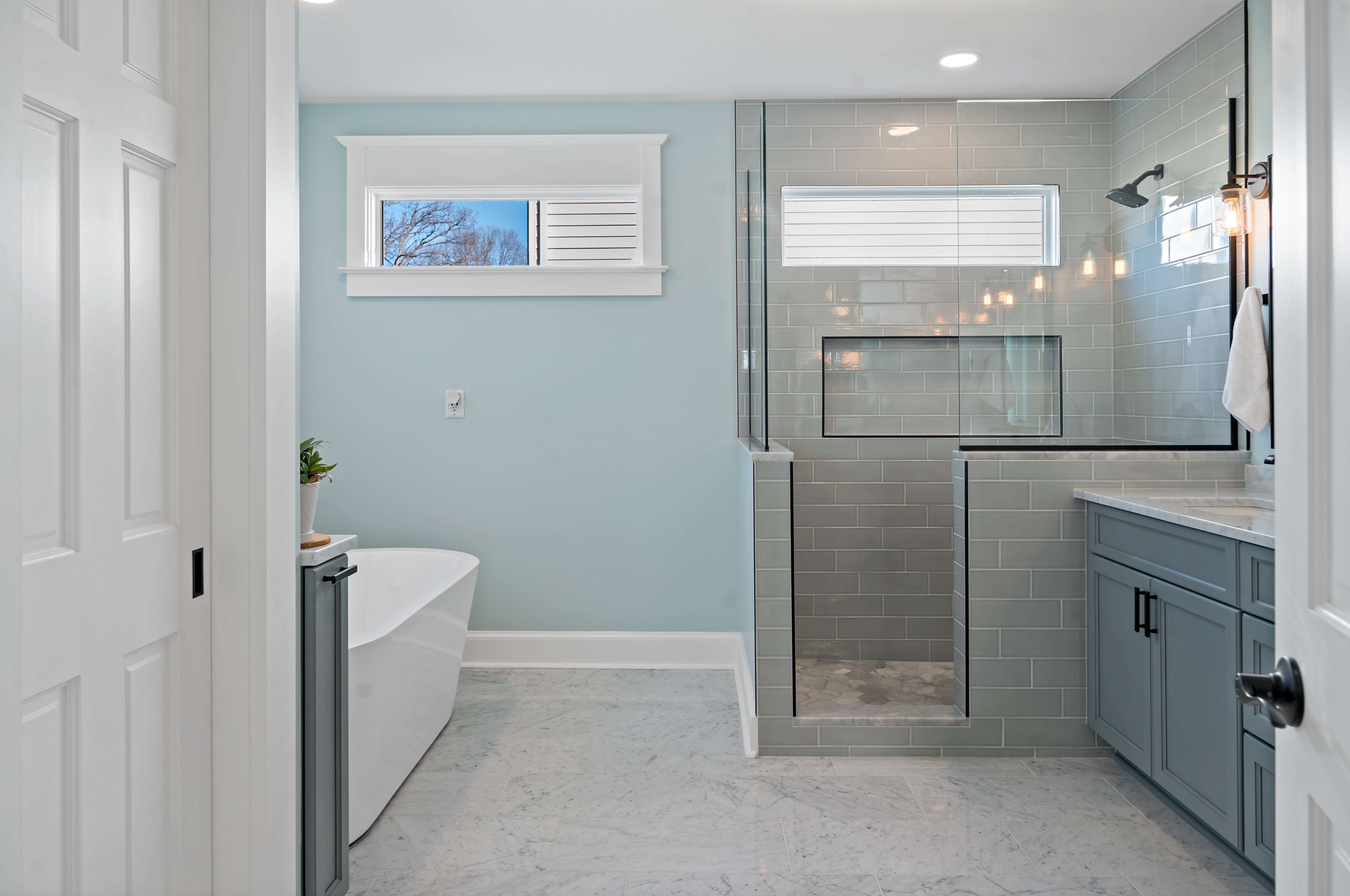 Large master bathroom with stand-alone tub and shower