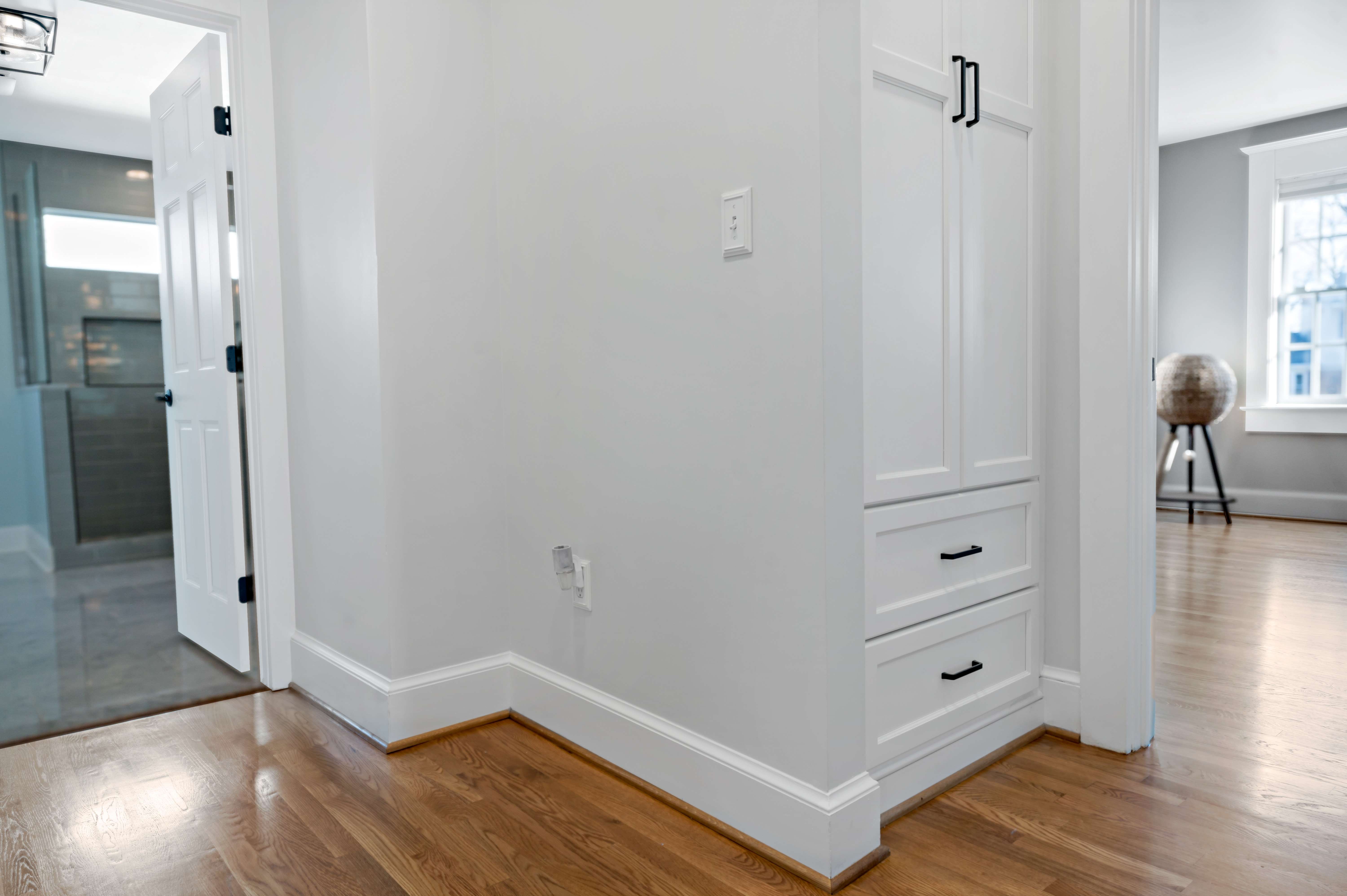 Hallway detailing with white trim