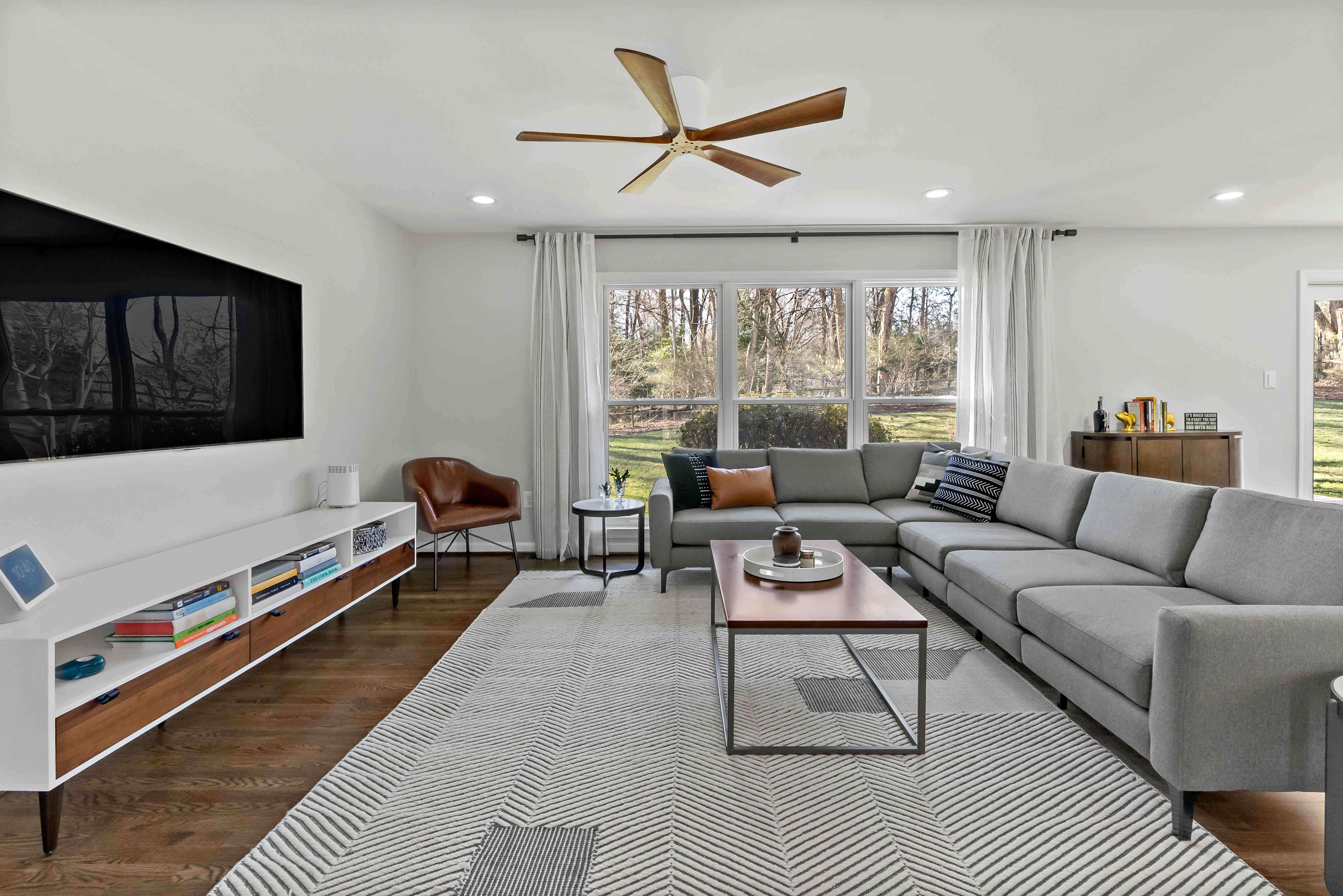 Area rug over hard wood floors in living space