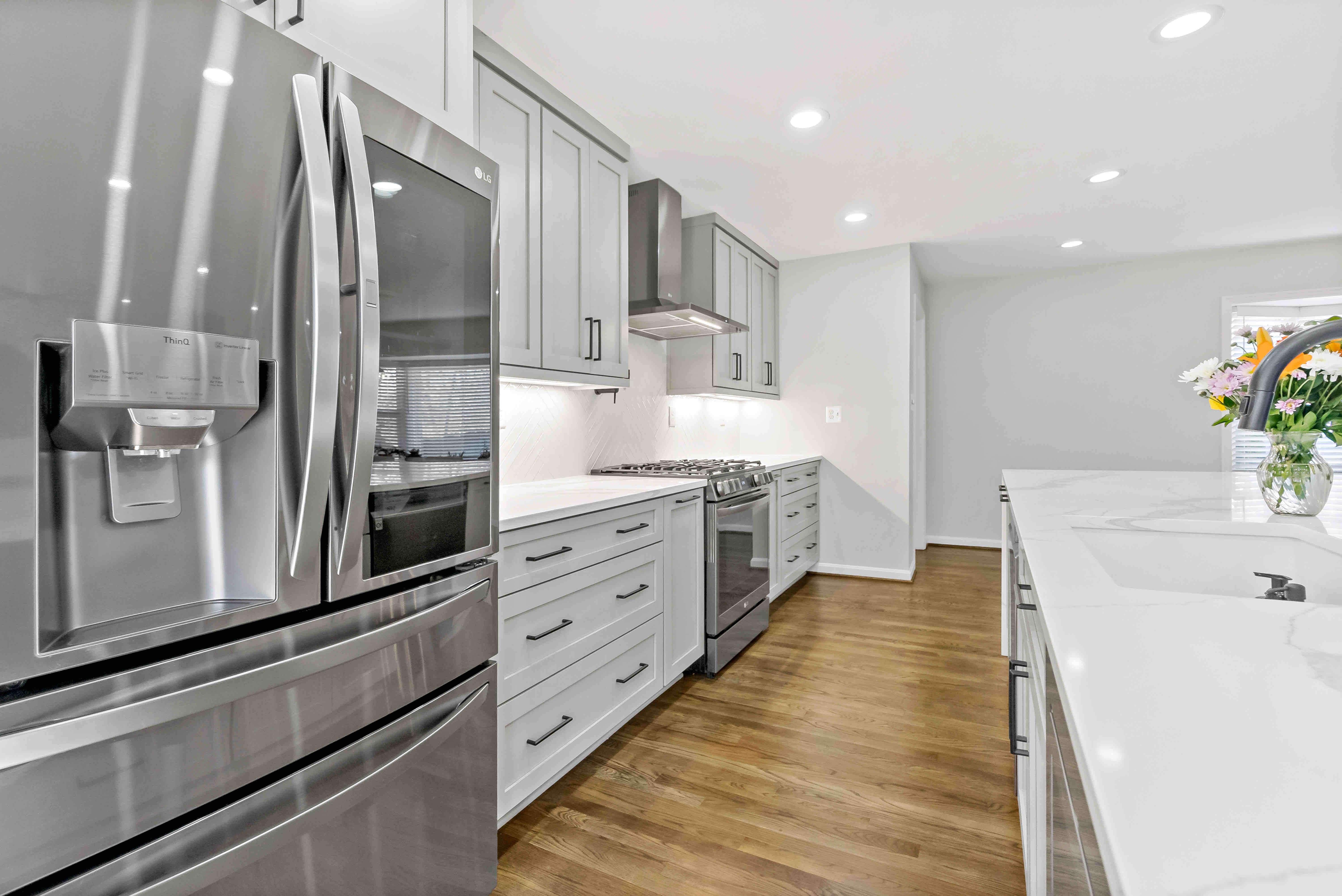 Kitchen cabinets and silver appliances in modern kitchen